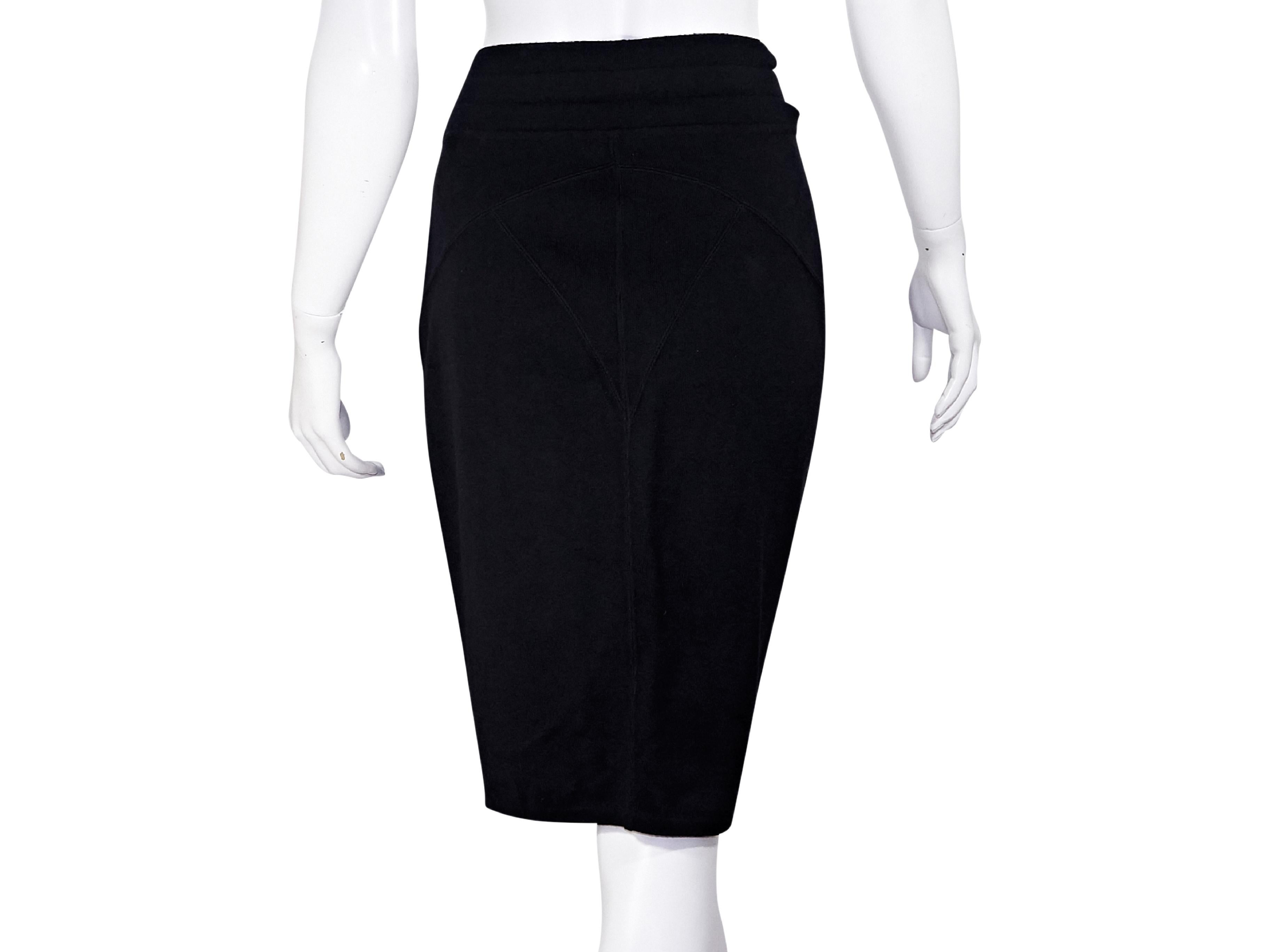 Product details:  Vintage black pencil skirt by Alaia.  Stretch fit.  Pull-on style.  28