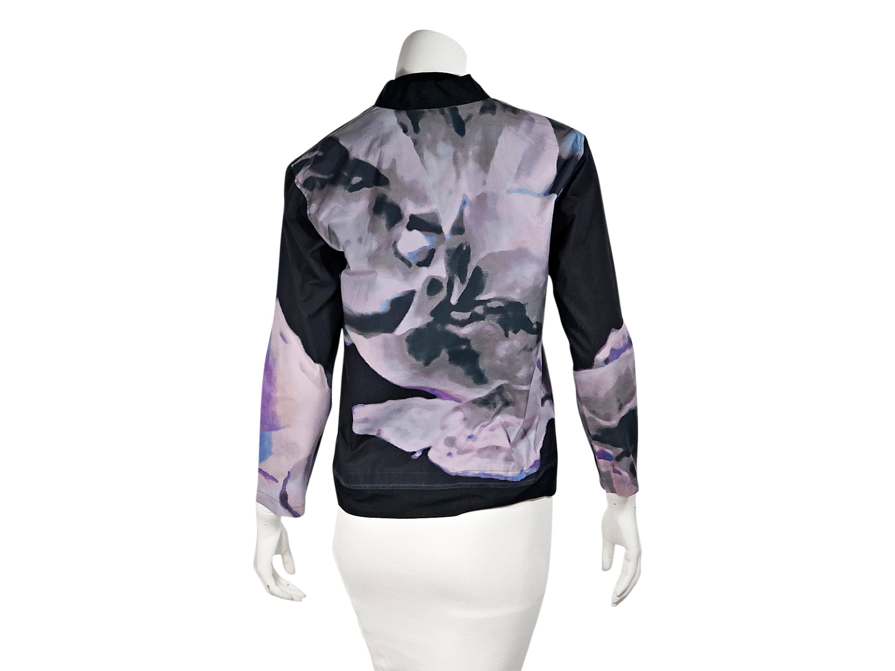 Product details:  Multicolor abstract-printed shirt and tank set by Issey Miyake.  Mock neck.  Three-quarter length sleeves.  Concealed front closure.  Coordinating shell top.  Sleeveless.  Pullover style.  Shirt:  35