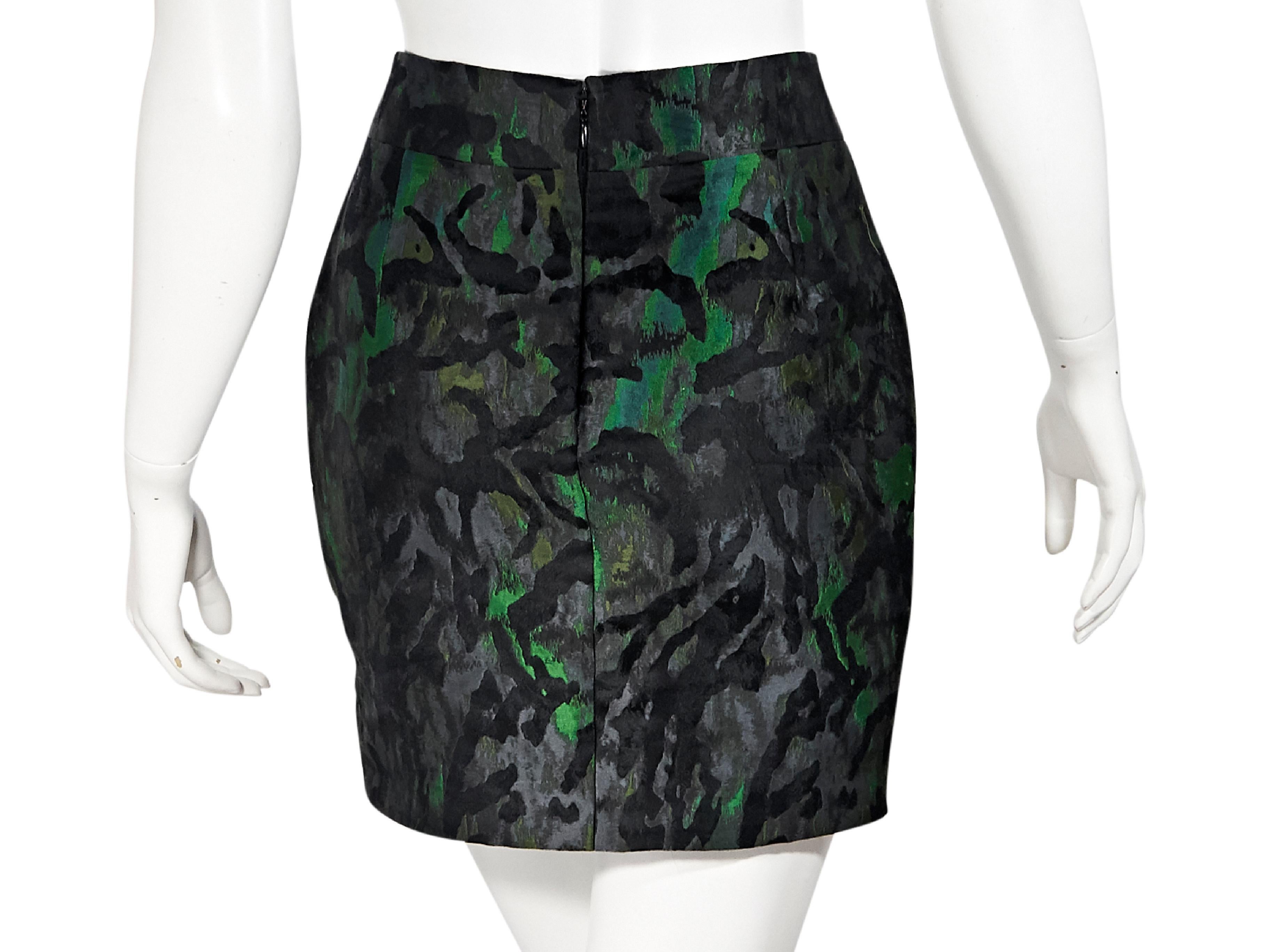 Product details:  Green and black mini skirt by Tom Ford.  Banded waist.  Concealed back zip closure.  27.5