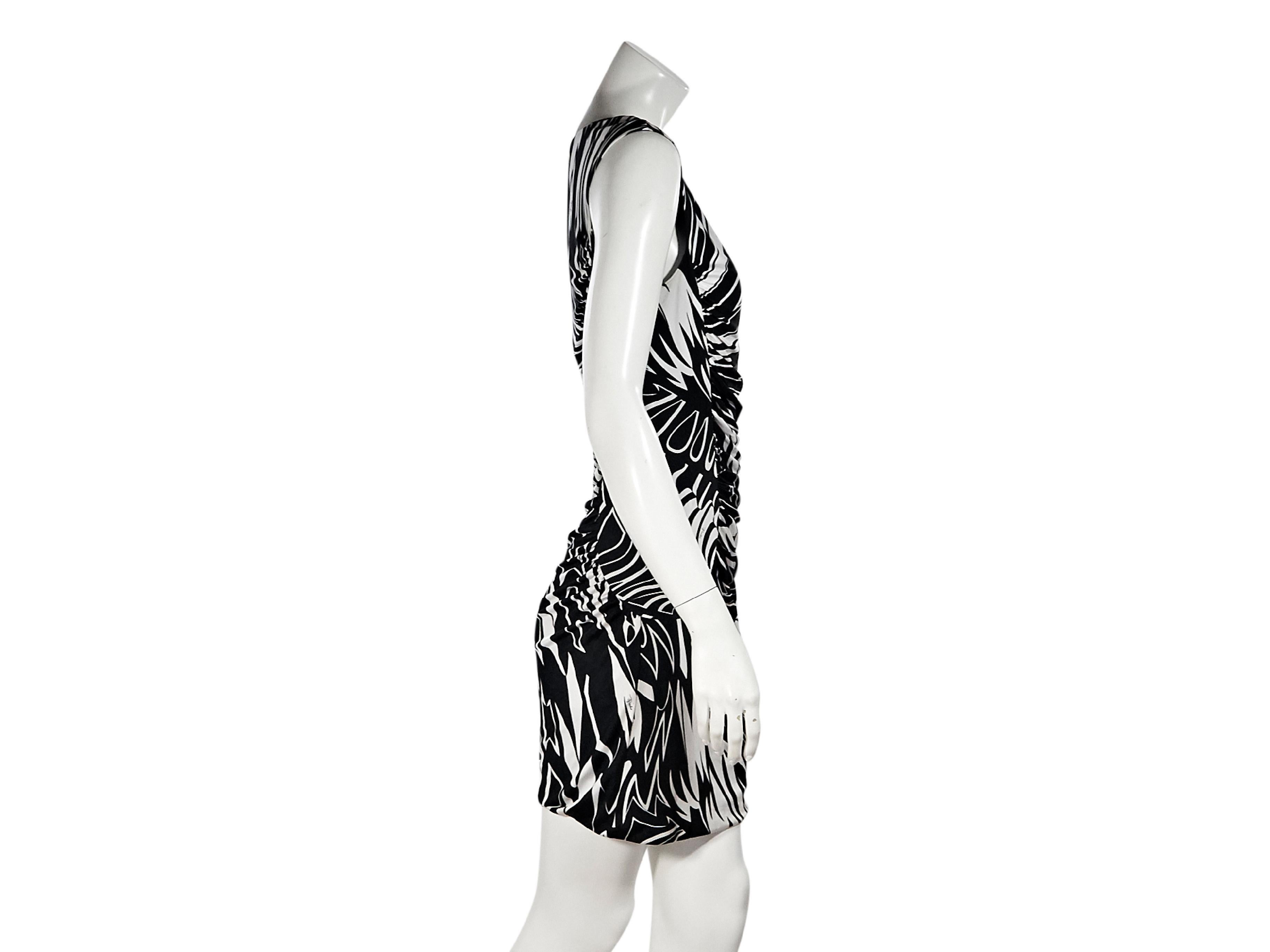 Product details:  Black and white printed jersey-knit mini dress by Emilio Pucci.  Scoopneck.  Cap sleeves.  Ruched design creates a flattering silhouette.  Pullover style.  32