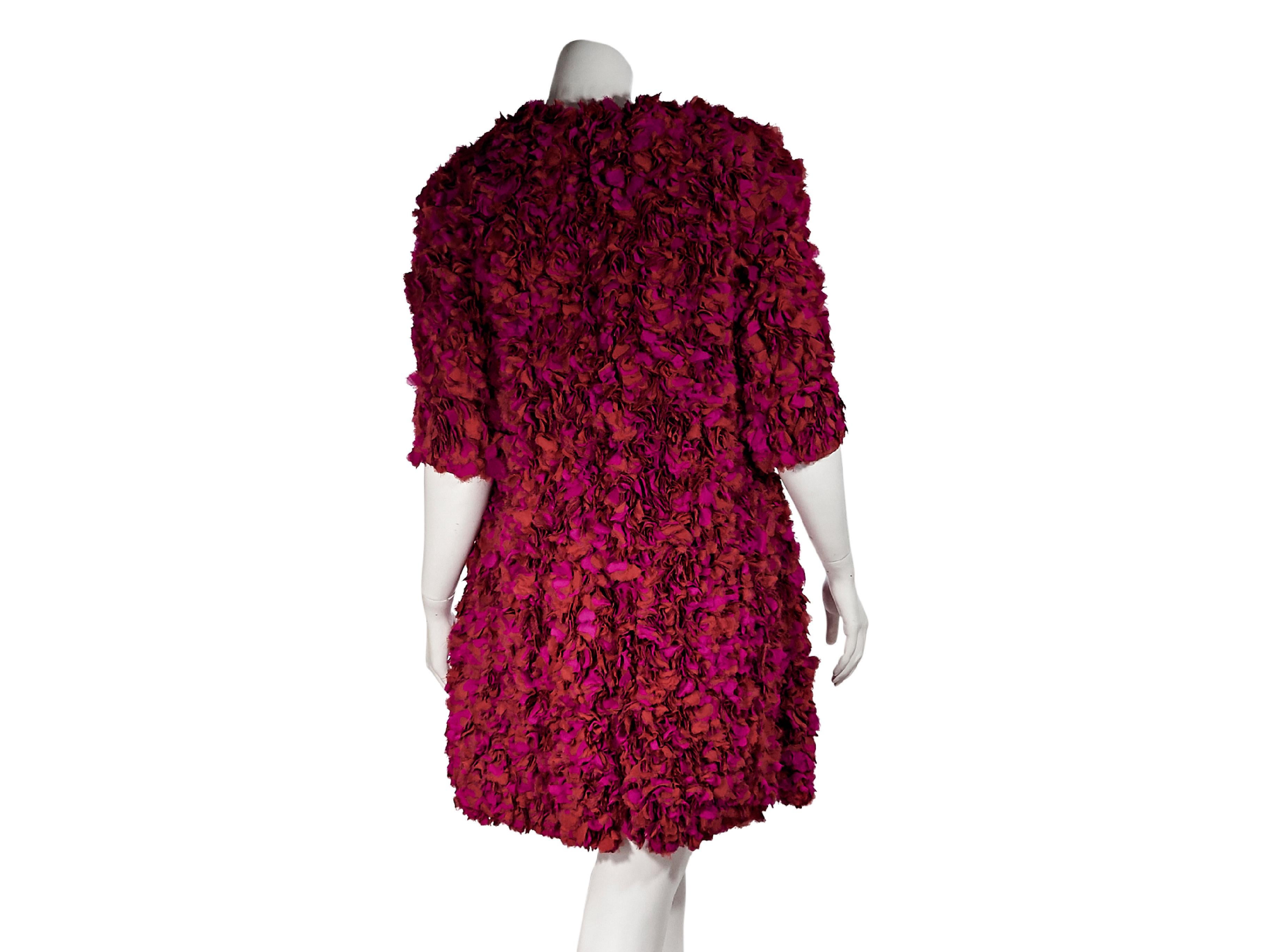 Product details:  Pink silk georgette petal coat by Jason Wu.  Crewneck.  Elbow-length sleeves.  Concealed hook front closure.  30