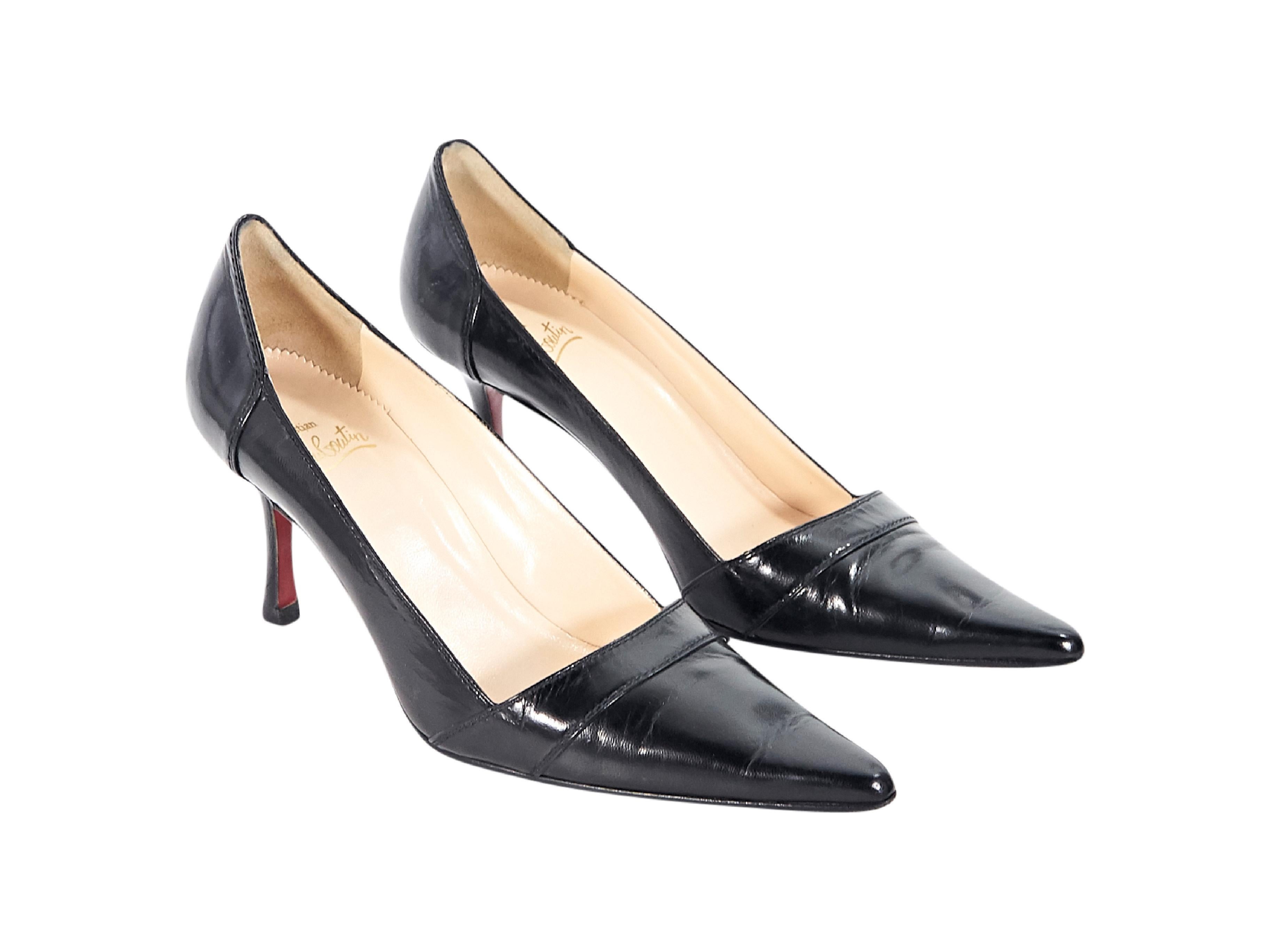 Product details:  Black leather pumps by Christian Louboutin.  Point toe.  Iconic red sole.  Slip-on style.  3