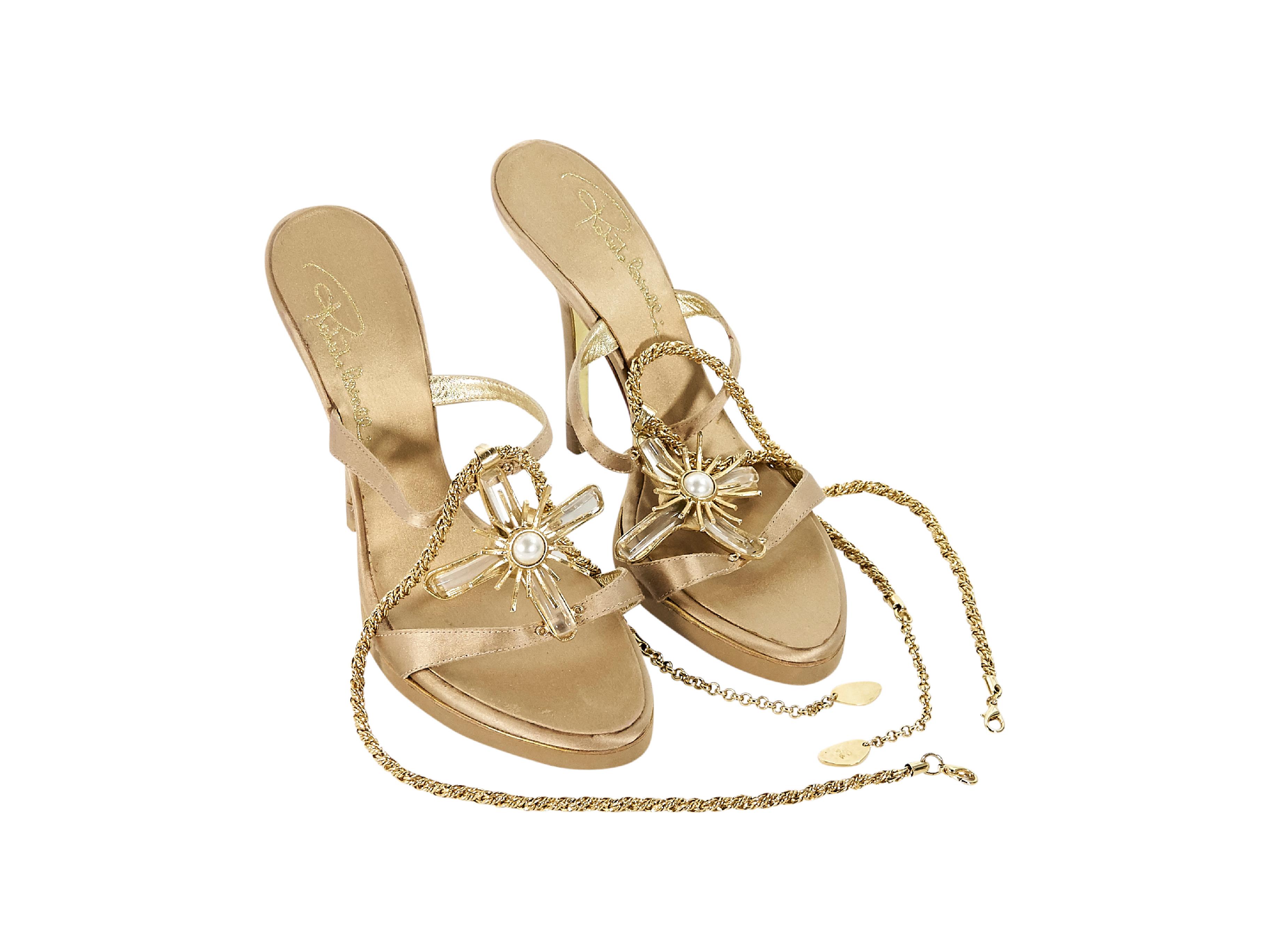 Product details:  Metallic gold satin strappy sandals by Roberto Cavalli.  Embellished instep.  Chain ankle straps.  Open toe.  4