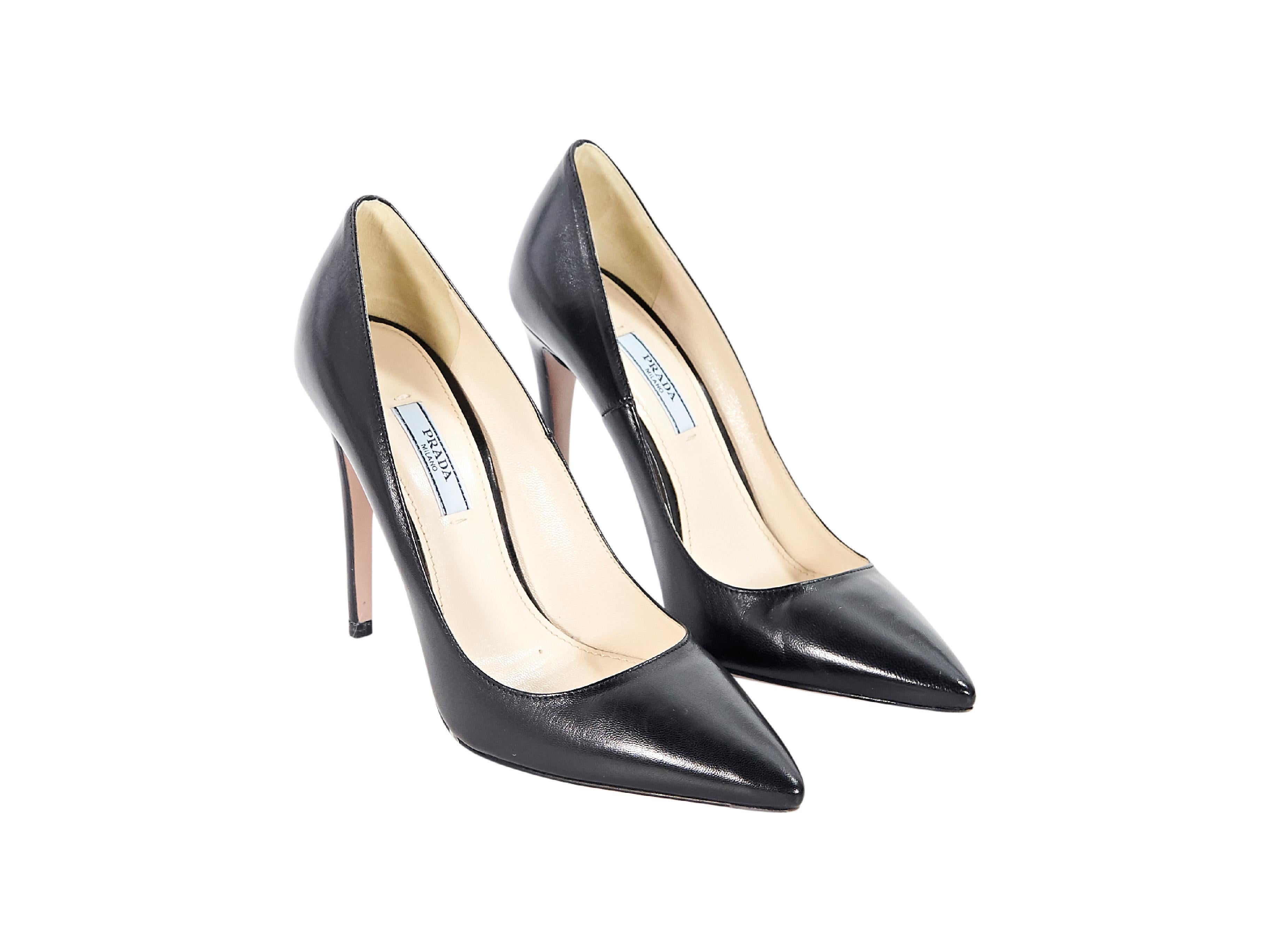 Product details:  Black leather pumps by Prada.  Point toe.  Slip-on style.  4.5
