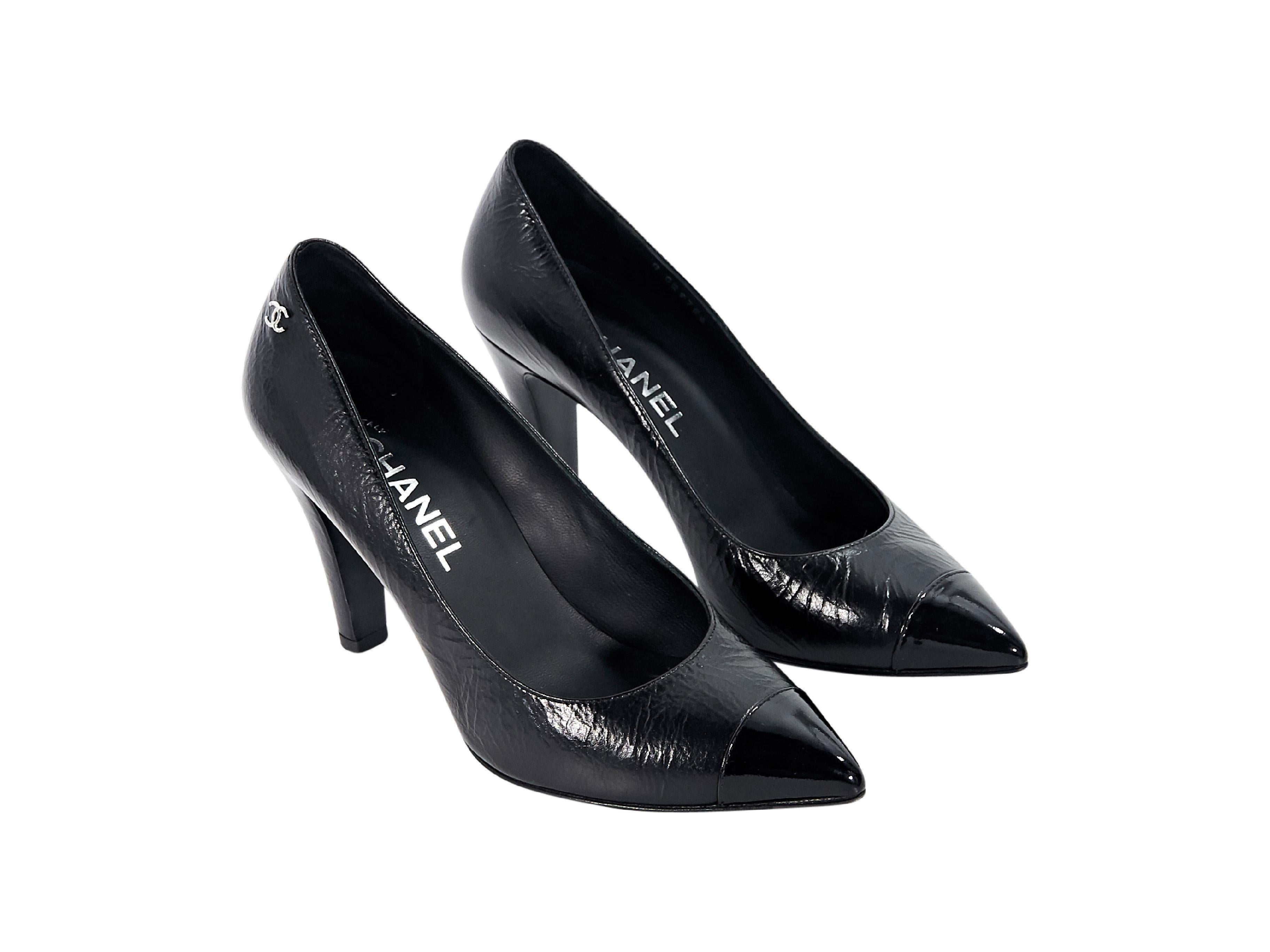 Product details:  Black leather pumps by Chanel.  Point cap toe.  Slip-on style.  3.75