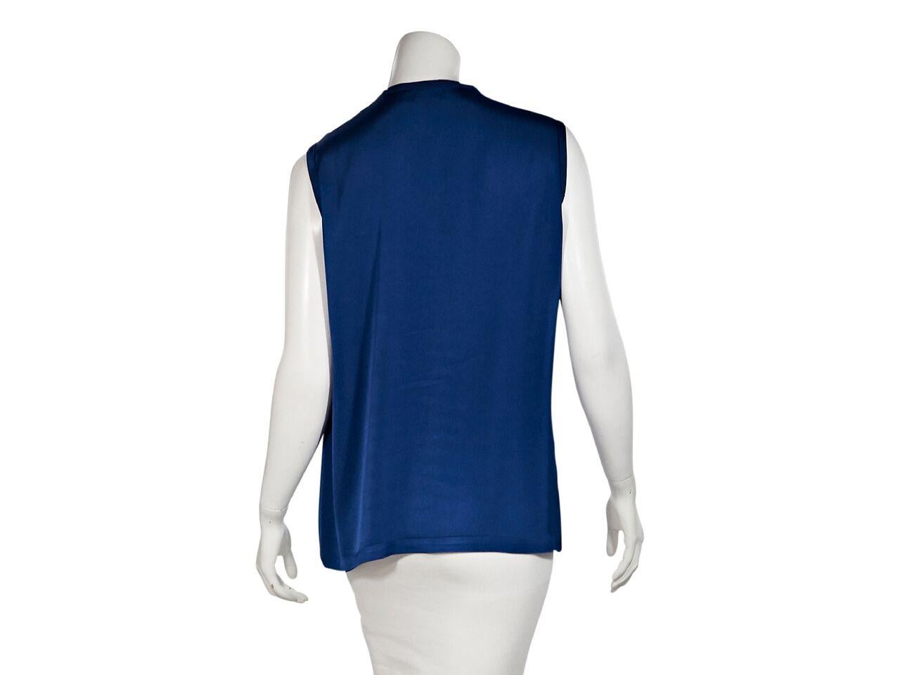 Product details:  Tonal blue silk-blend blouse by Lanvin.  Splitneck.  Hook closure with keyhole cutout.  Sleeveless.  Pullover style.  Label size FR 40.  40