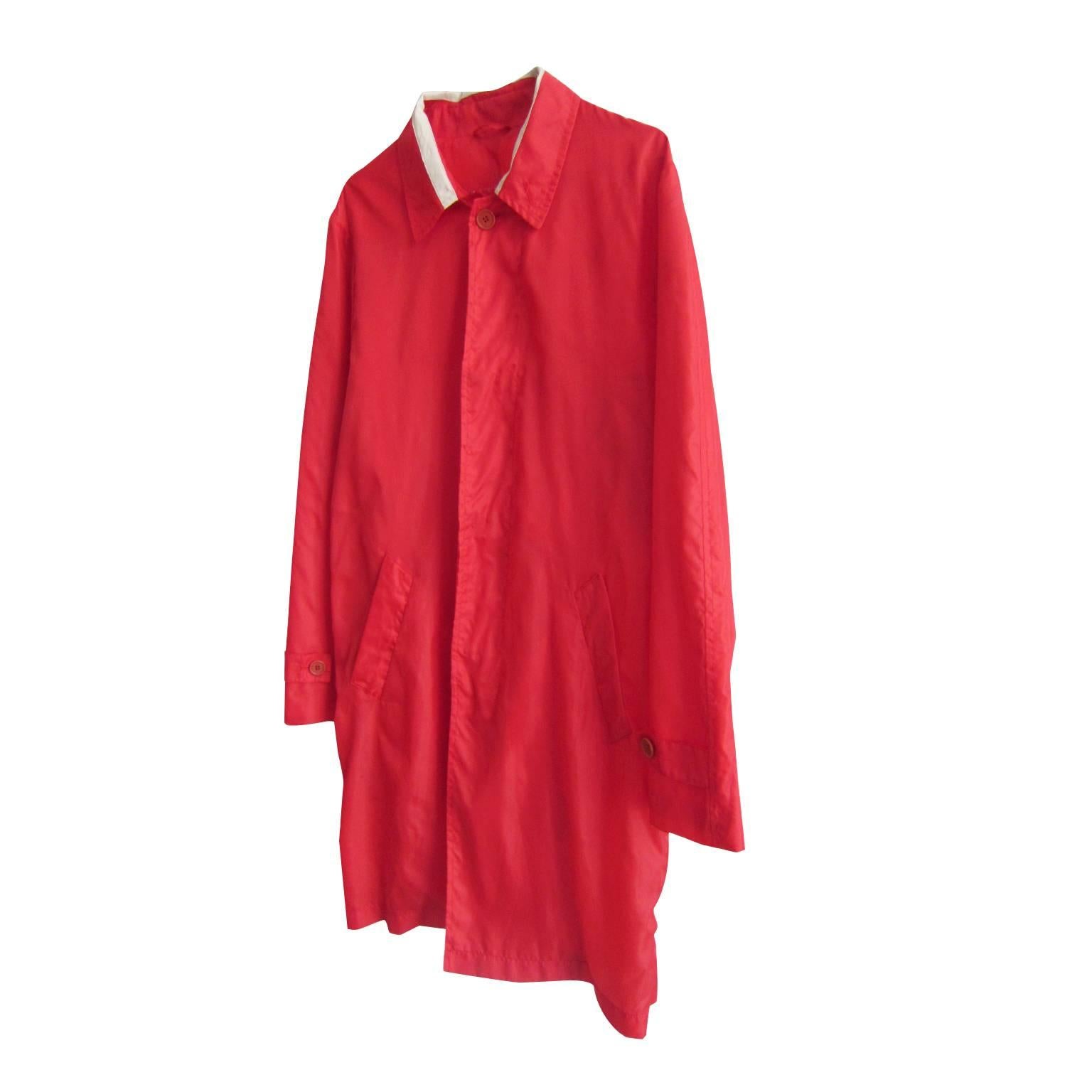 Helmut Lang neon red nylon buttoned coat jacket from S/S 1997. With light beige tape detail on the neck. 
Original size : 46 Italian
Measurement :
Sleeve : 63 cm
Length : 95 cm (From neck point back)
Shoulder : 46 cm
Under arm : 53 cm
