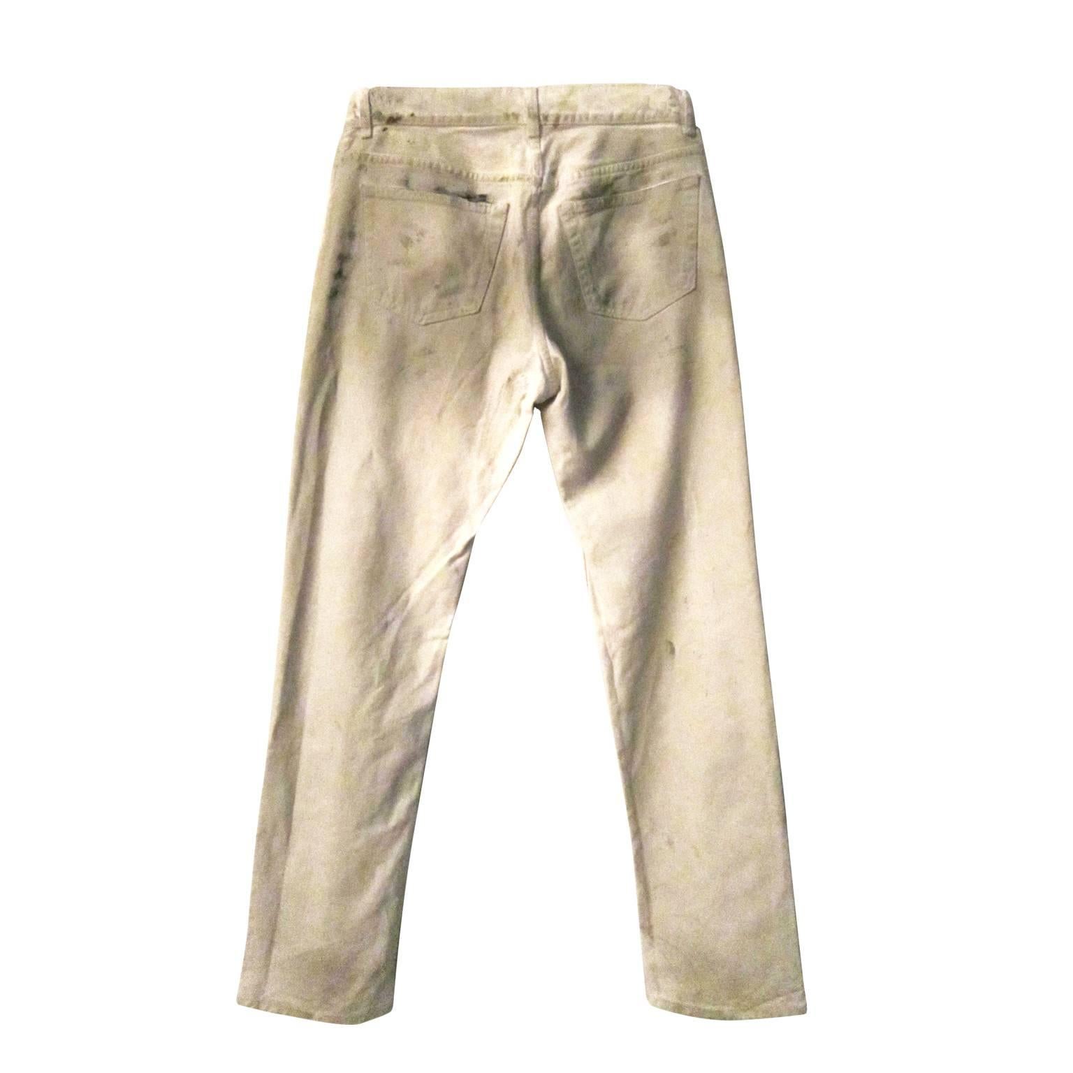 Helmut Lang painter jeans from end of 1990's. This pair has rare shades of colour grey on off-white heavyweight denim. 
Made in Italy.
Measurements :
Waist : 84 cm
Length : 112 cm
