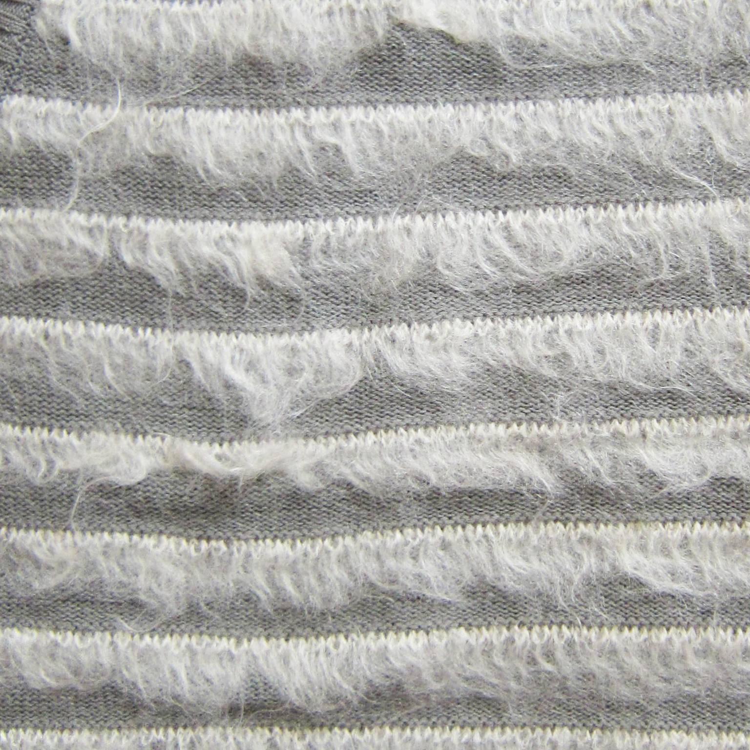 Martin Margiela grey knit sleeves with long mohair stripe detail.
Measurements : 
Length from shoulder point : 67 cm