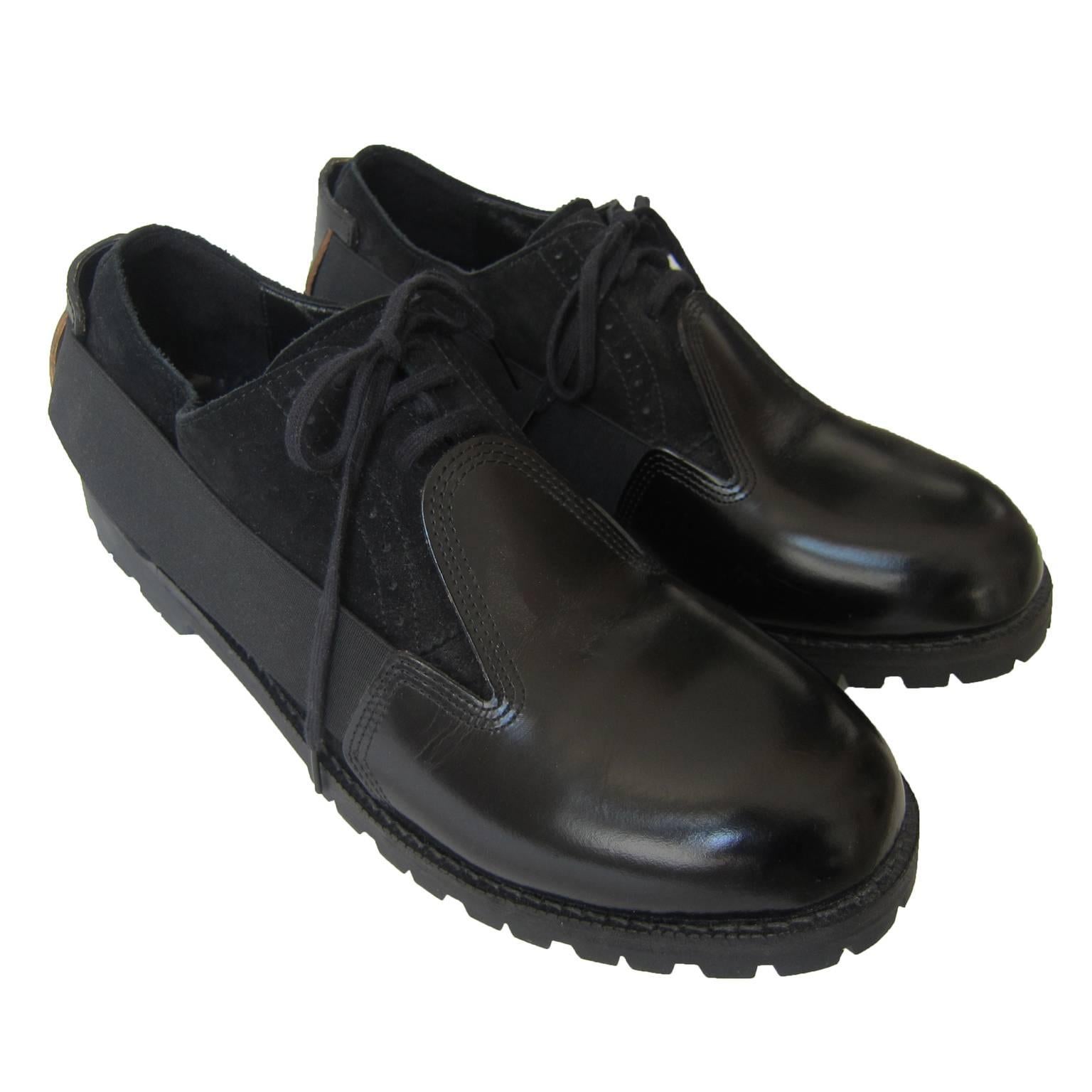 Comme des Garcons Homme Plus black suede mix leather shoes with elastic detail.
New without box. 
Size : 27 cm Japan (US 9.5 / EU 43.5)

