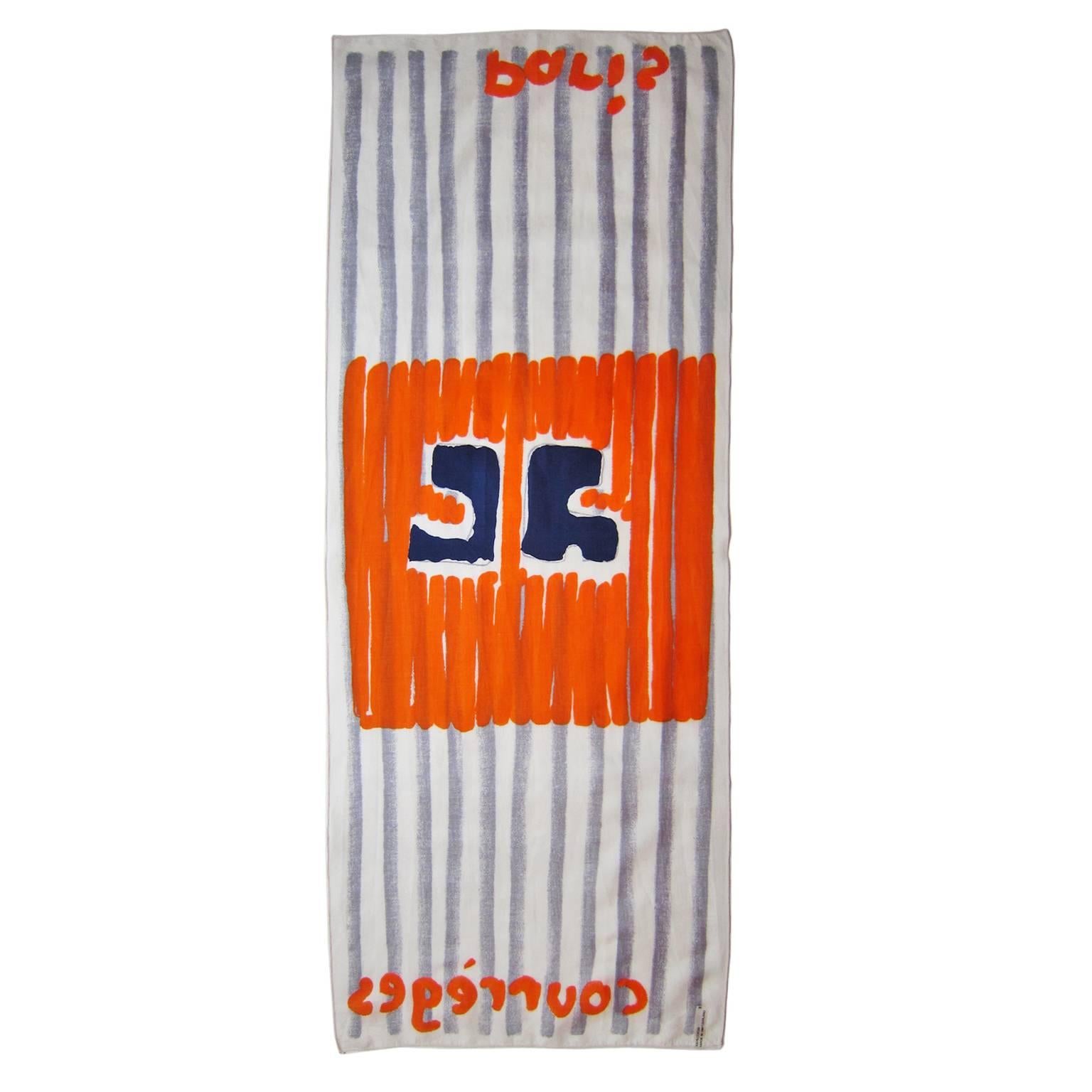 Courreges cotton scarf from 1960s. In white / light grey stripe, bright orange and navy hand drawn graphic logo.
Made in Switzerland.

83 cm x 33 cm