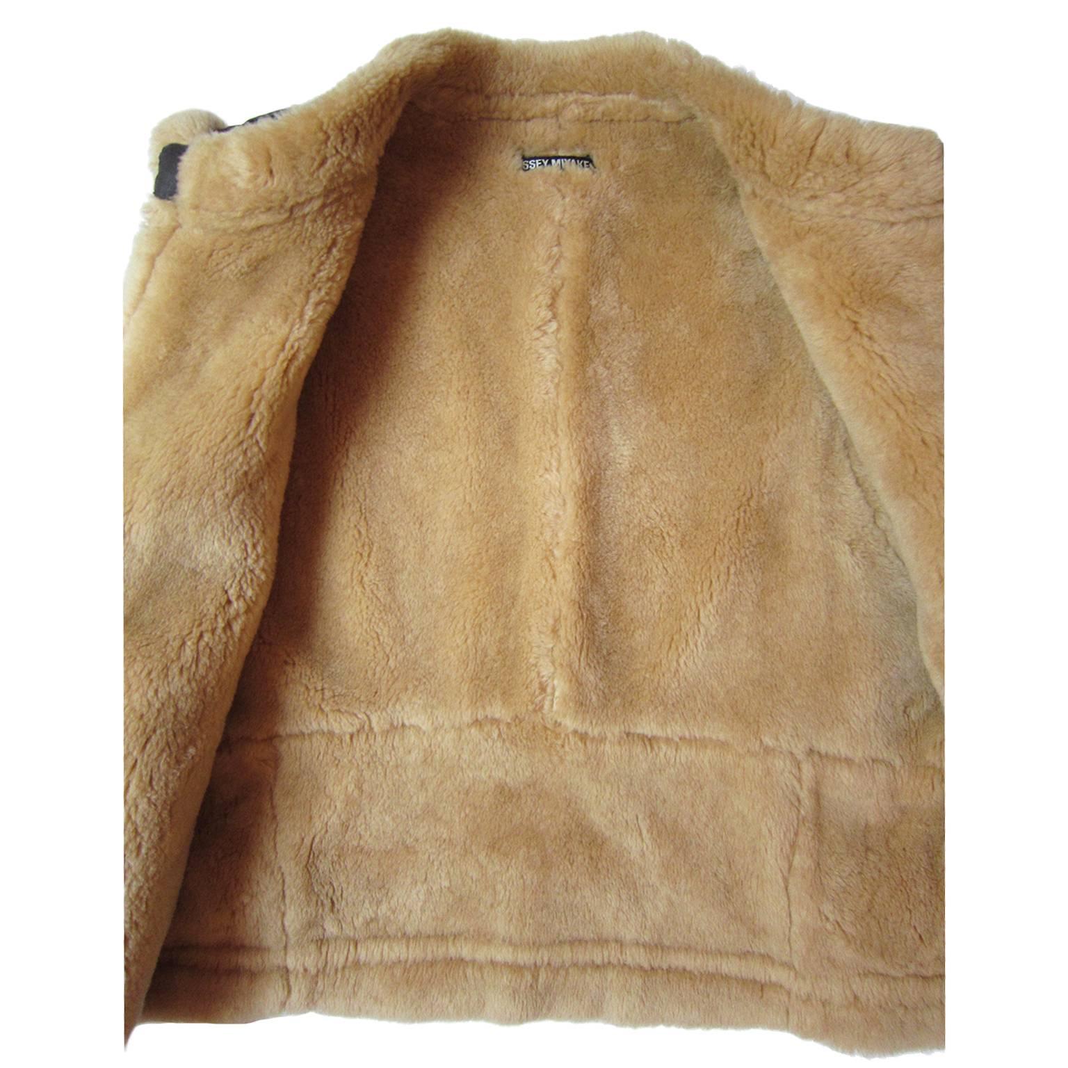 Issey Miyake wool vest in brown tone. 
Measurements :
Shoulder : 44 cm
Underarm : 56 cm
Length 70 cm