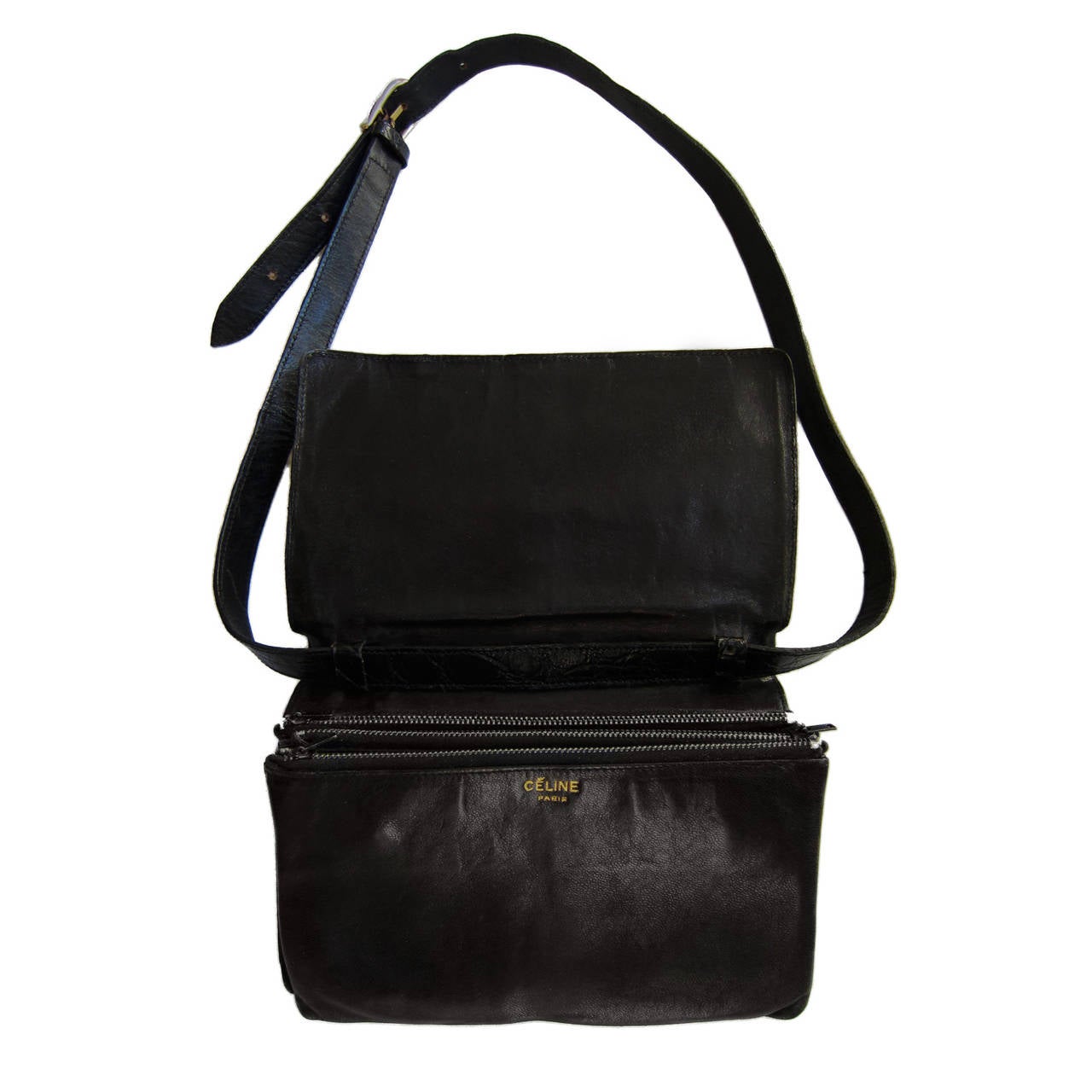 Classic 1970's Celine trio shoulder bag in Black Crocodile. Three zip compartment, belted flap with adjustable shoulder strap.
13 x 20.5cm 
Made in Italy