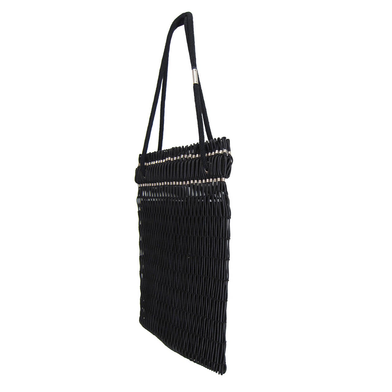 Helmut Lang 90's black woven purse with silver metal detail.
It has black lining with suede purse attached with leather.
Made in Italy