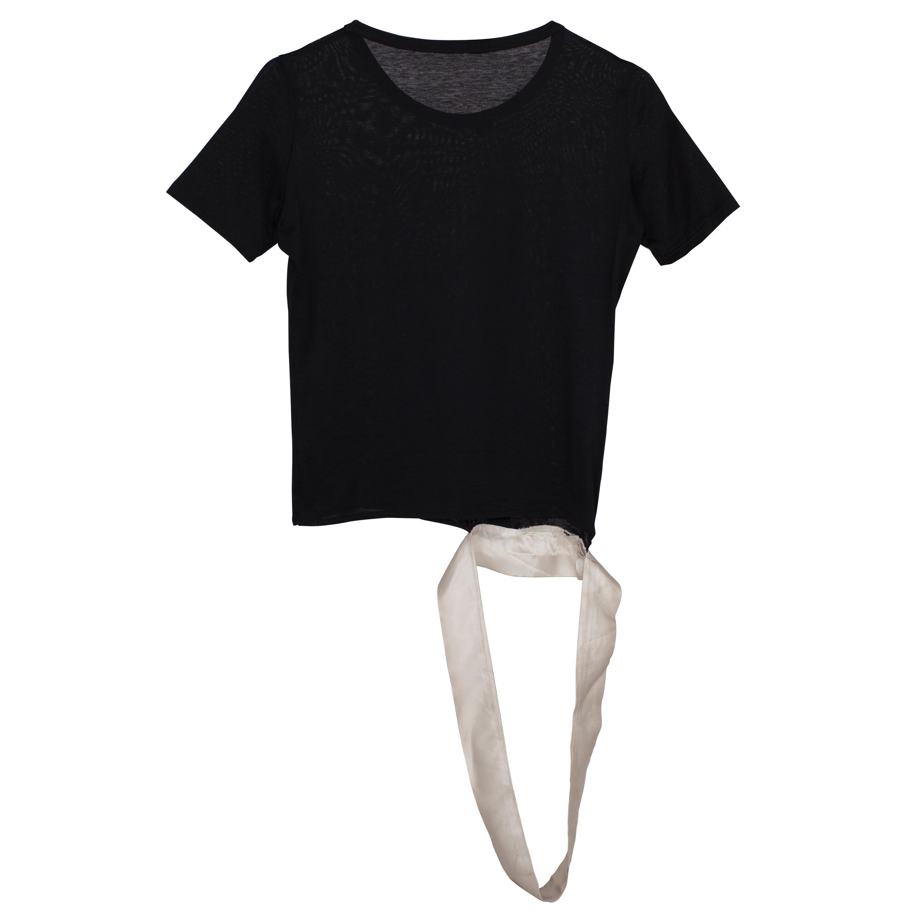 Archival Helmut Lang black T shirt with white satin cutout hem panel detail from SS 1997.
Tag missing on the neck line, only side tag remains.







