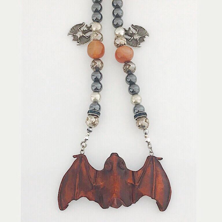 Gothic Revival Exolette Agate Necklace Holding a Hand Carved Wooden Netsuke Bat For Sale