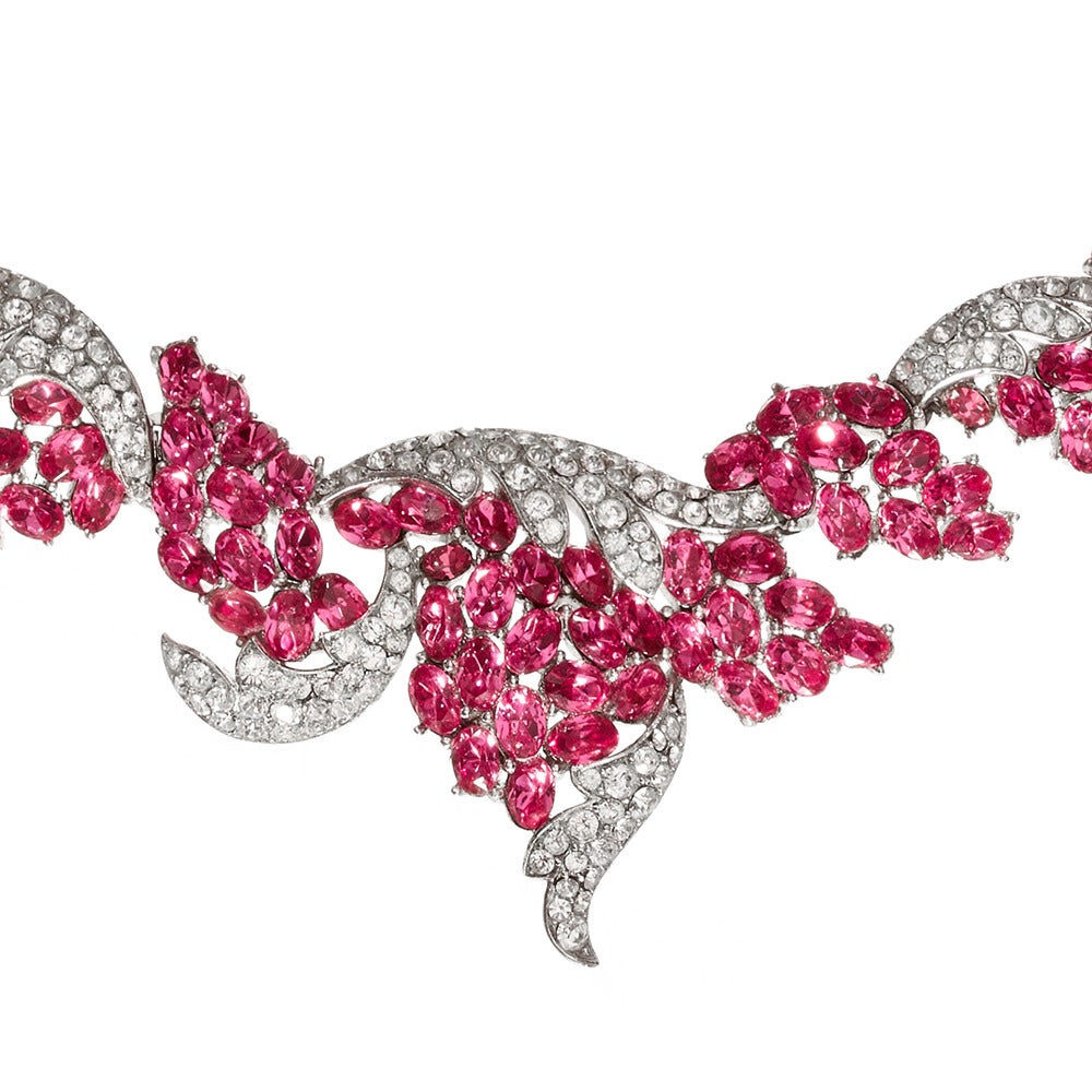 Exceptional Trifari floral chocker necklace designed by Trifari’s head designer Alfred Philippe.

One of the most show stopping pieces in the Passionate About Vintage collection.

The oval rhinestone are fuchsia, the shade of pink tourmalines,