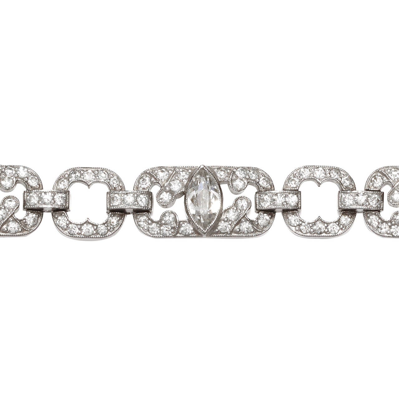 Delicate and exquisite Art Deco Rhodium plated bracelet by Engel Brothers, set with crystal rhinestones.

The openwork design is made up of 10 articulated pave set panels.

The bracelet measures 18cm long and 1cm wide.

Marked: E.B.