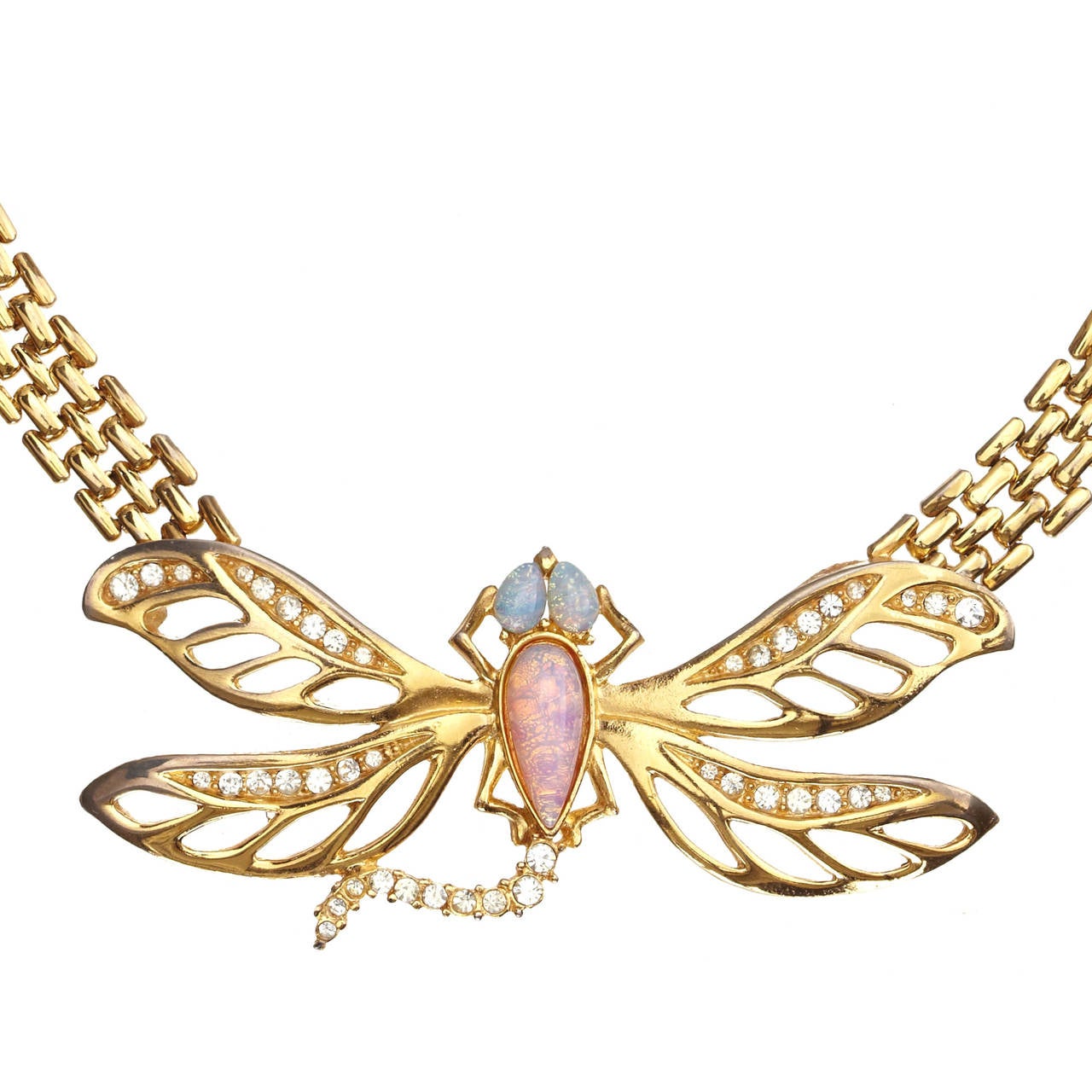 Fabulous 1980's dragonfly necklace designed by Givenchy. 

The dragonfly focal is 7cm across and 3.5cm wide, it is attached to a 5 row beaded linked chain which is 16 inches or 41cm long.

The dragonfly has delicate wings in an open work design.