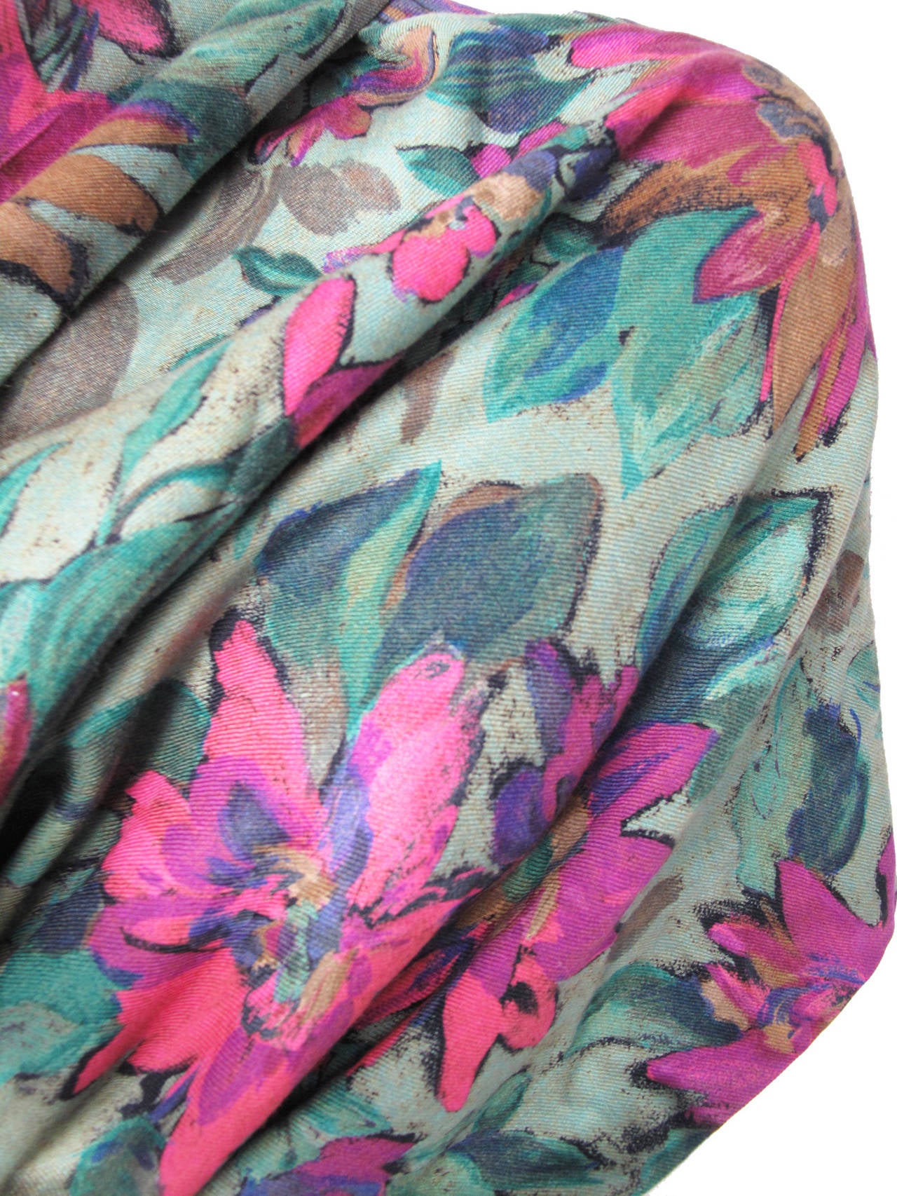 Gorgeous large light wool Ungaro floral shawl with black tassels on ends.  Green, pink, purple, mustard colors.   Condition: Excellent, looks new. 

One size