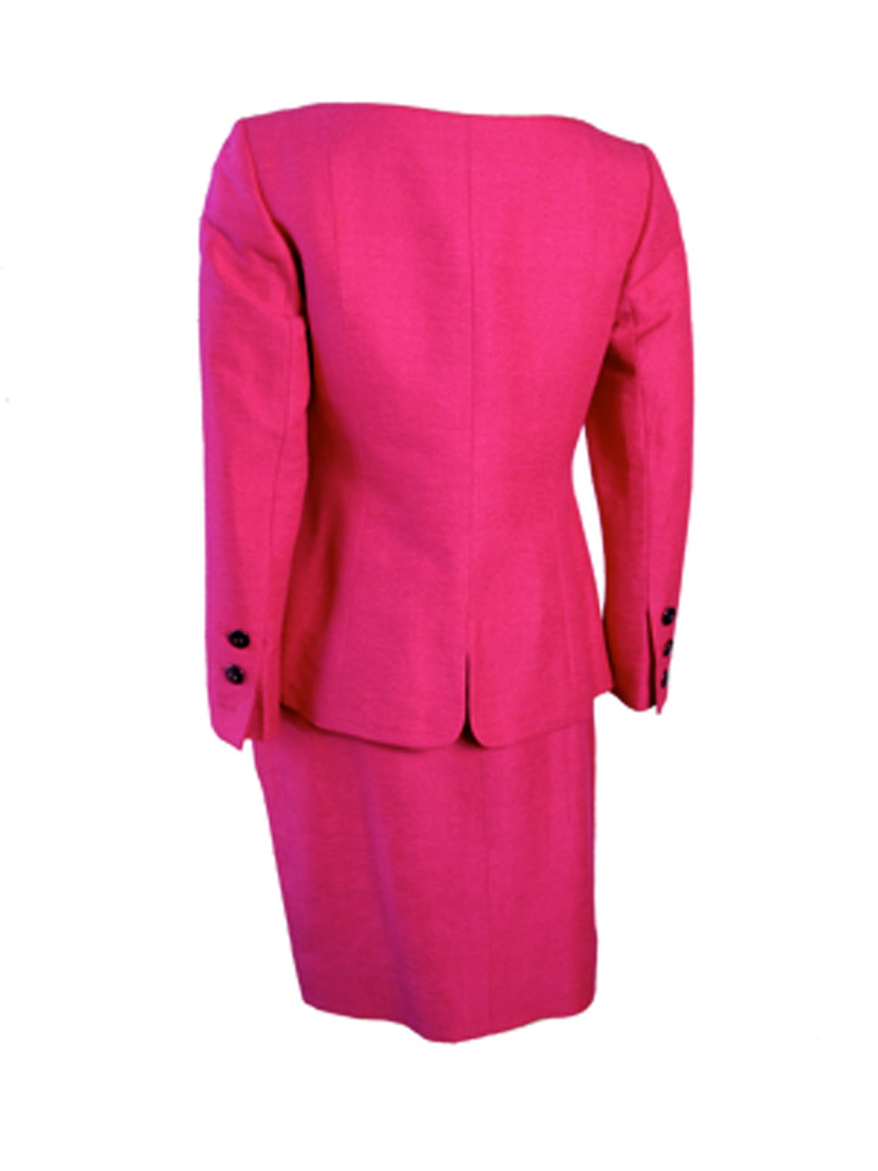Vintage Yves Saint Laurent hot pink silk suit.36" bust, 33"waist, 22" sleeve, 15"shoulder. Skirt: 27"waist, 21" length. Condition: Very good, one button missing on sleeve. Size 40

We offer returns for refund, please