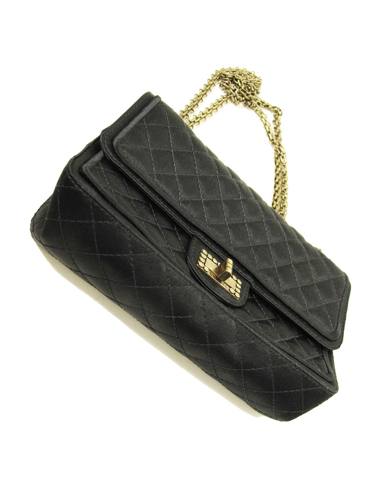 CHANEL Black Quilted Satin 2.55 Double Flap Bag circa 2009 / 2010
Heavy Chain, double flap. Perfect bag for day and night. Excellent vintage condition. 
Approximate measurements : 9 1/2