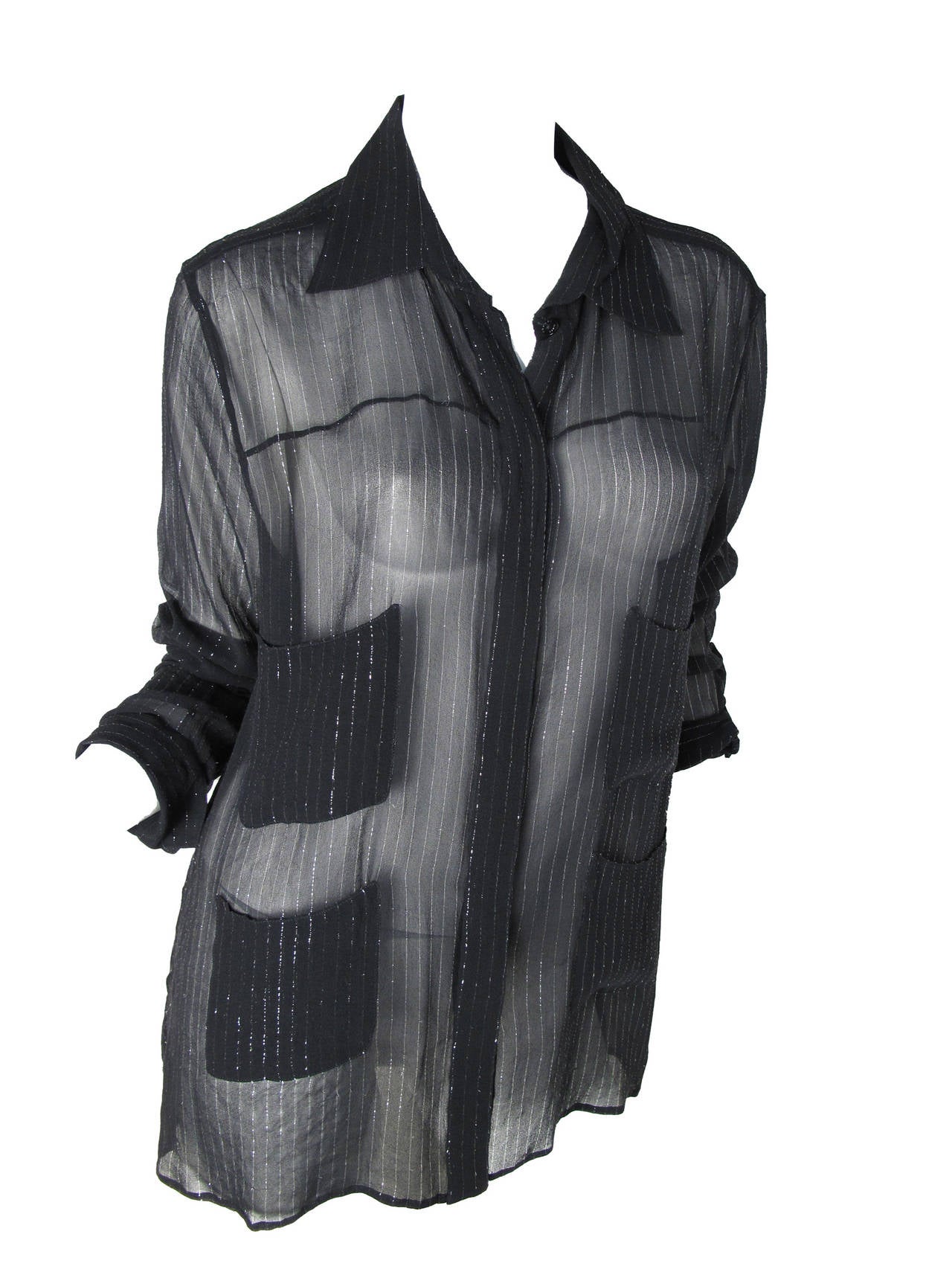 Chanel black sheer blouse with silver metallic stripe c. 2004.  Four front pockets.  42