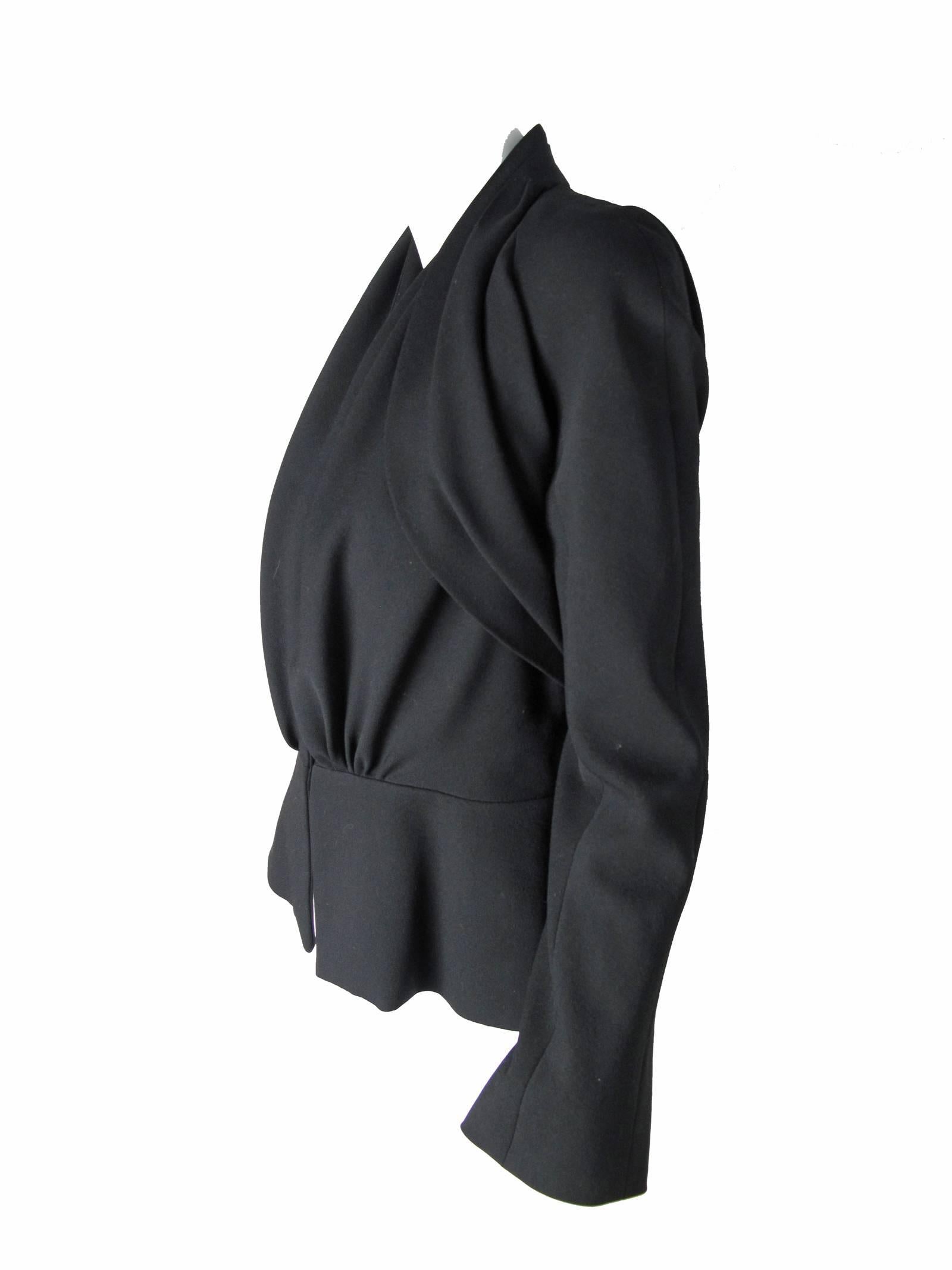 Christian Dior black wool 40s inspired jacket with pleating on shoulders. Snaps to  close.  34