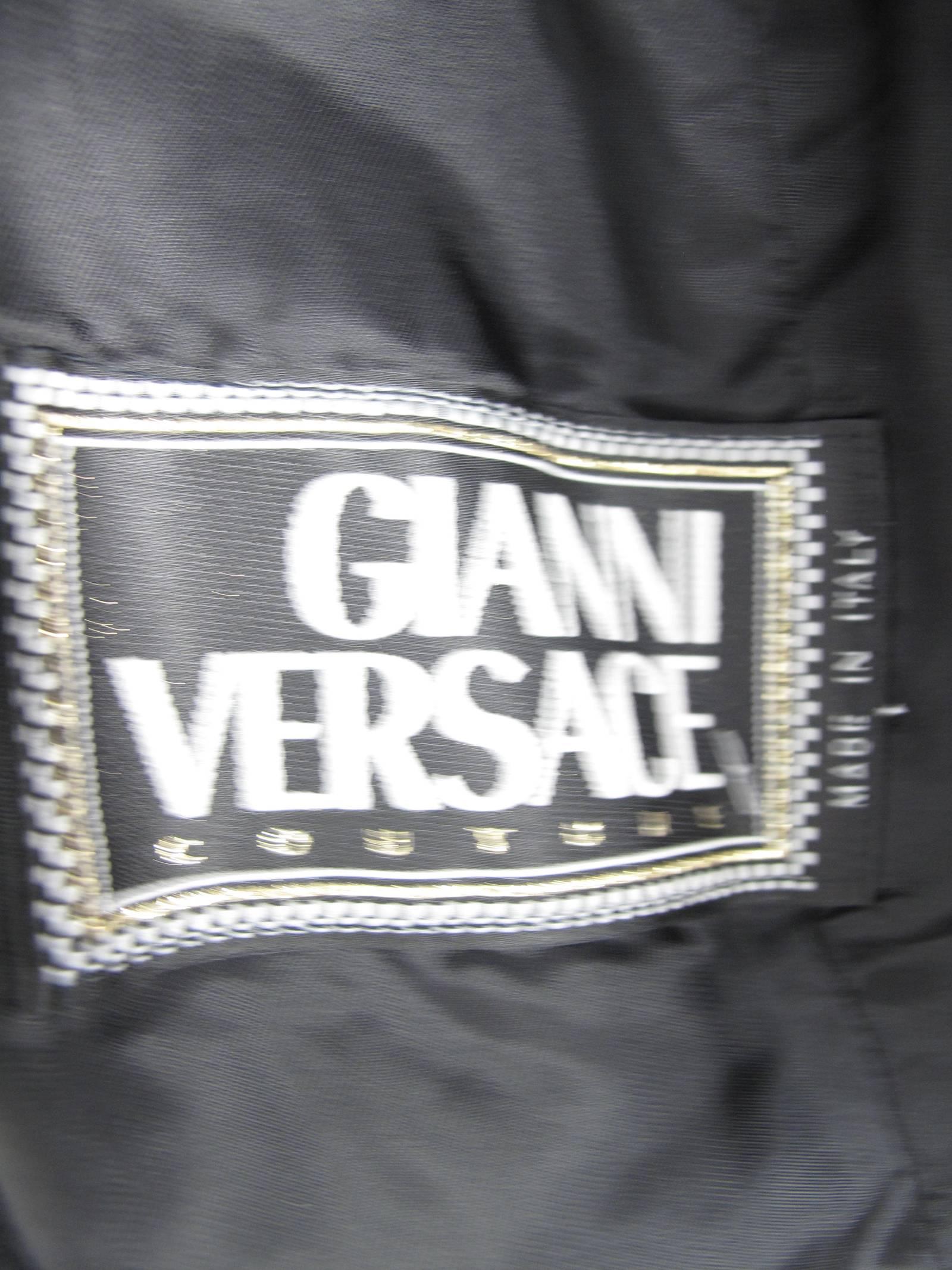 1990s Gianni Versace black wool jacket with medusa buttons  1