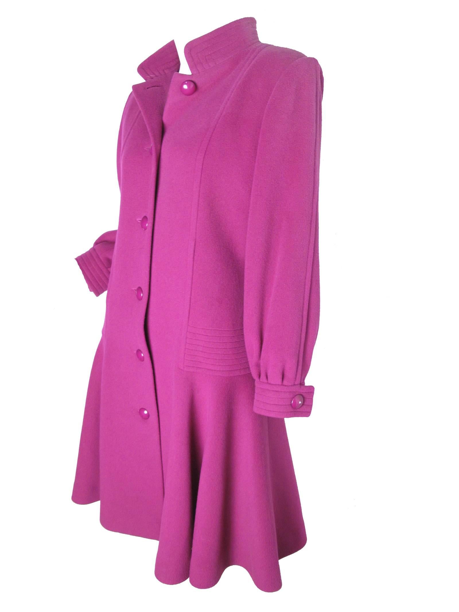 Nina Ricci purple wool coat.  Condition: Excellent . Size 8
We accept returns for refund, please see our terms.  We offer free ground shipping within the US.  Please let us know if you have any questions. 
