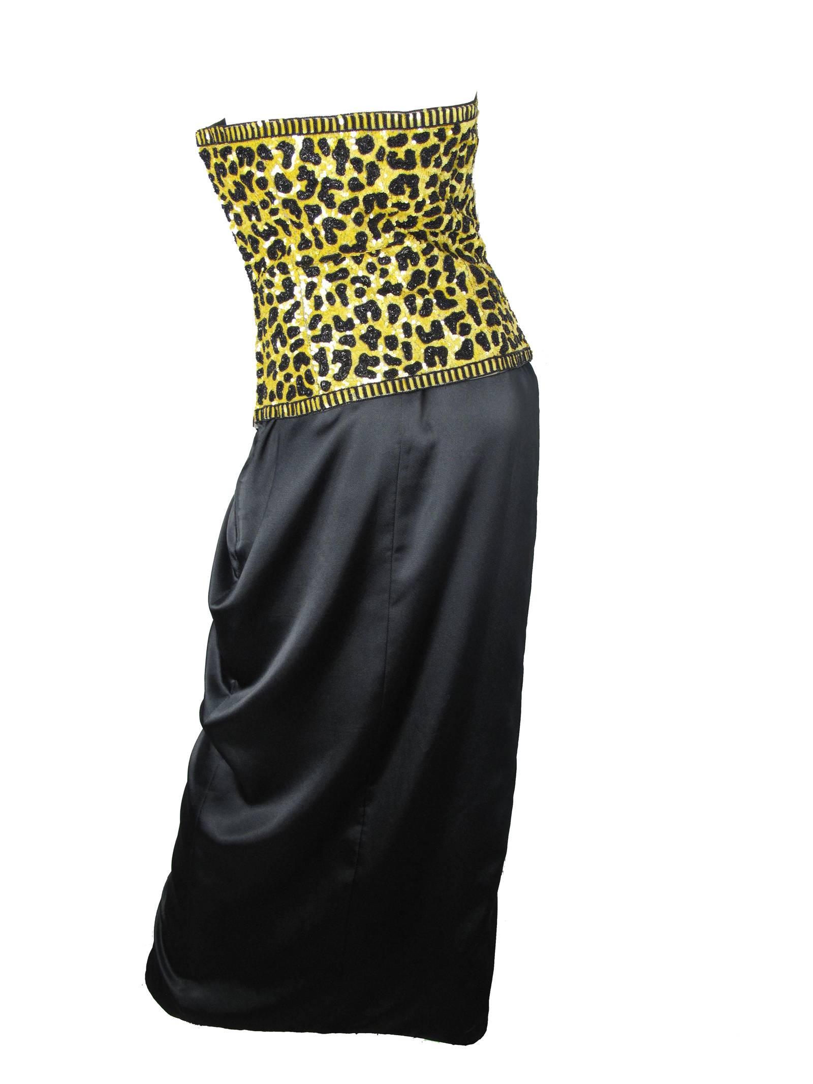 Richelene satin gown with gold and black leopard print sequins and beading.  Condition: Excellent.  Size Medium.  36
