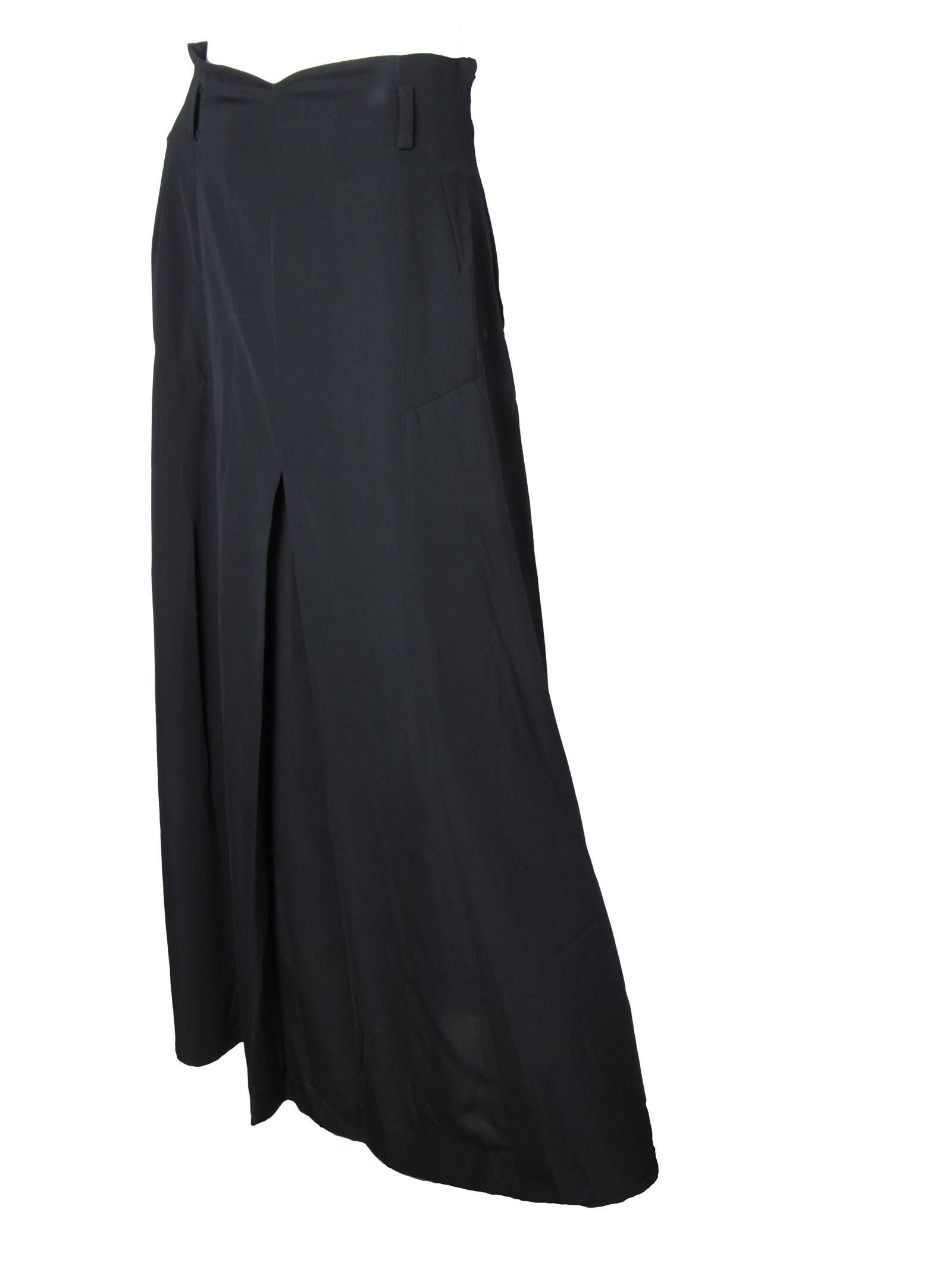 Matsuda black polyester skirt with pleating at back.   Condition: Very good, missing belt.  Made in Japan.  Size Medium

27