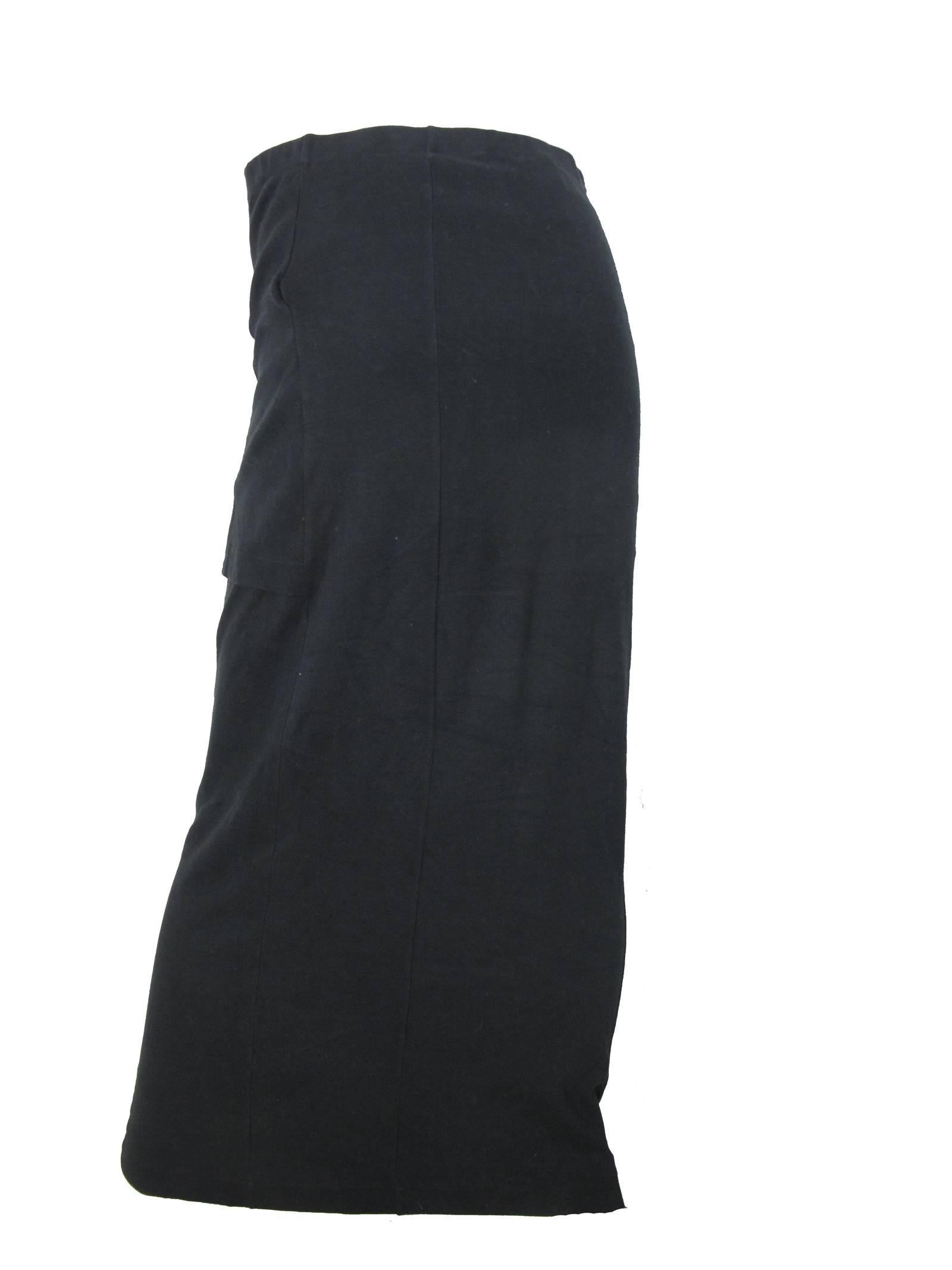 Comme des Garcons black cotton skirt with overlapping front cummerbund. 
Size Medium  
29