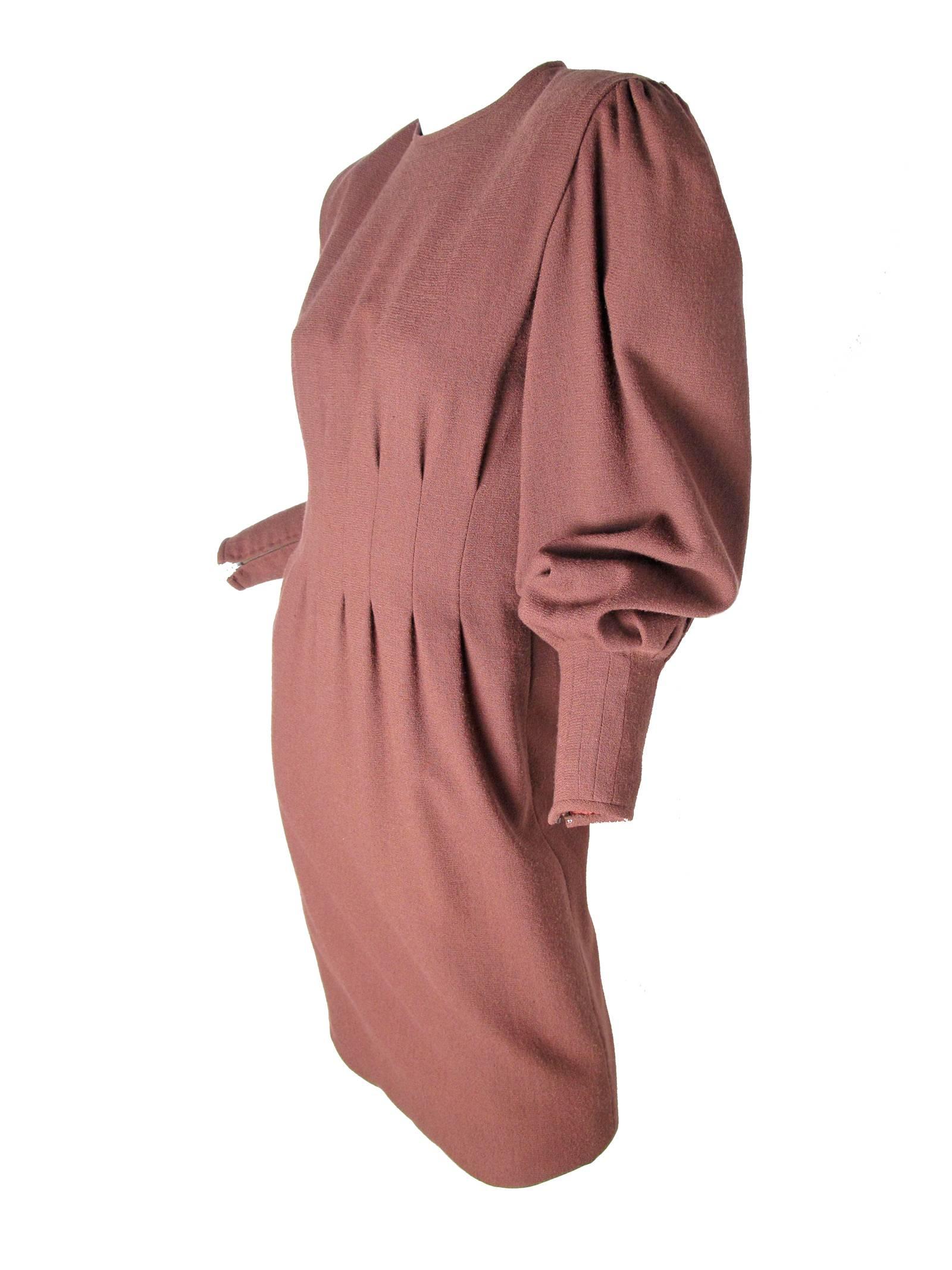 Michael Novarse brown wool dress with pleating at waist and cuffs. 
Condition: Very good, some all over wear.  Size 8

36