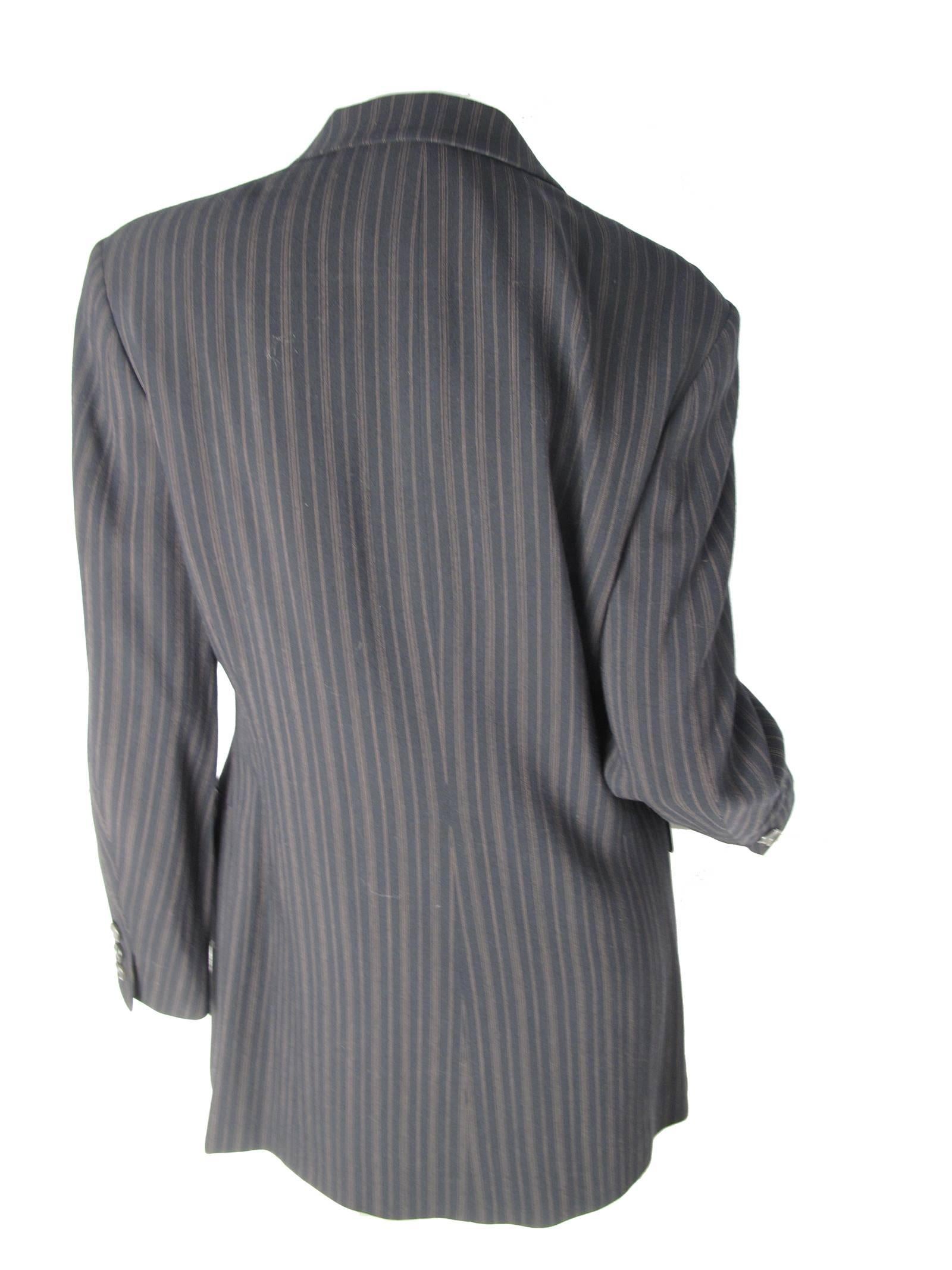 Jil Blazer pinstriped wool blazer, two front pockets, buttons down front. Condition: Excellent. Size 38
39