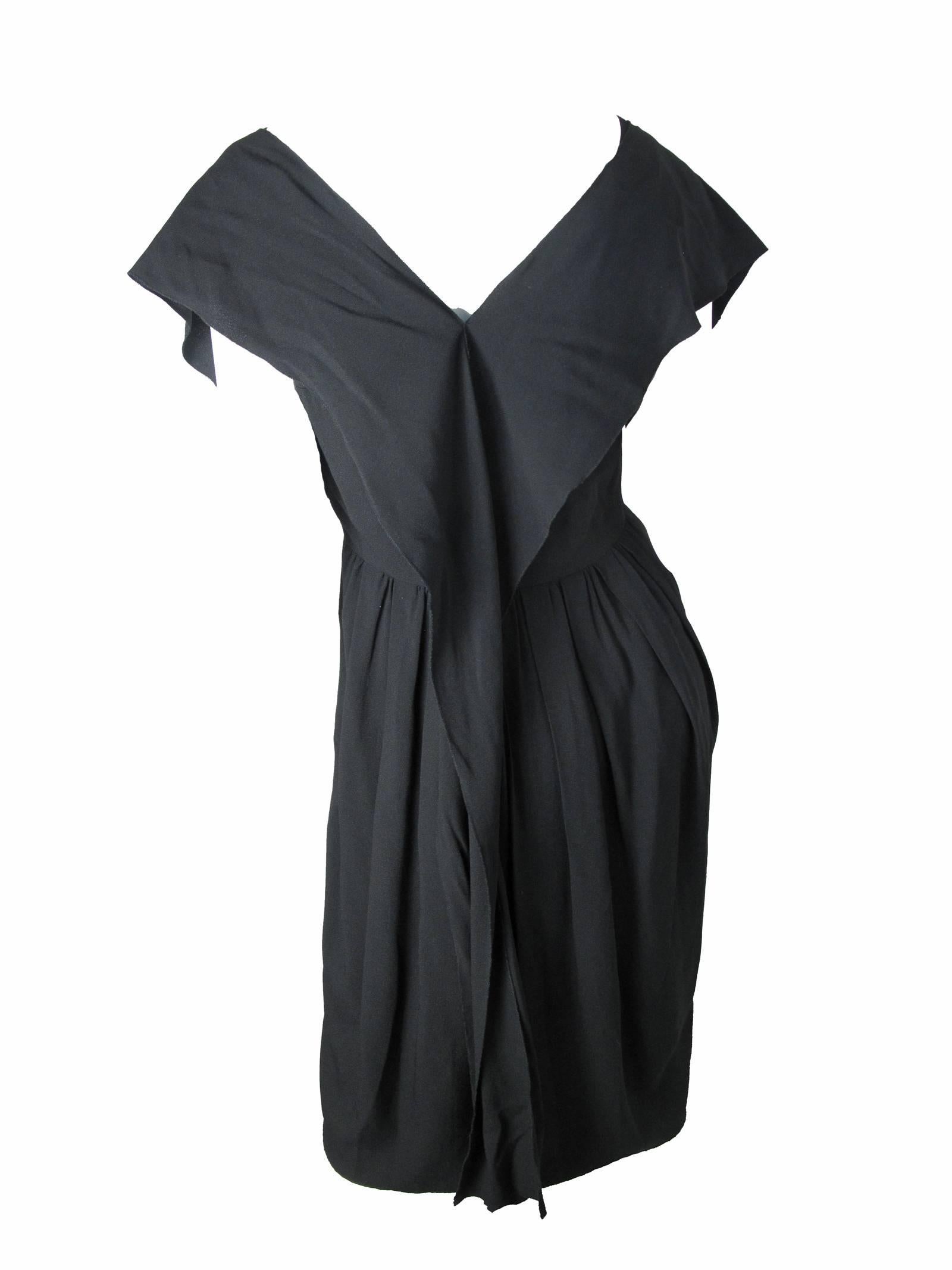 Prada black acetate and viscose dress.  Condition: Excellent. Size 44
Made in Italy  .  35