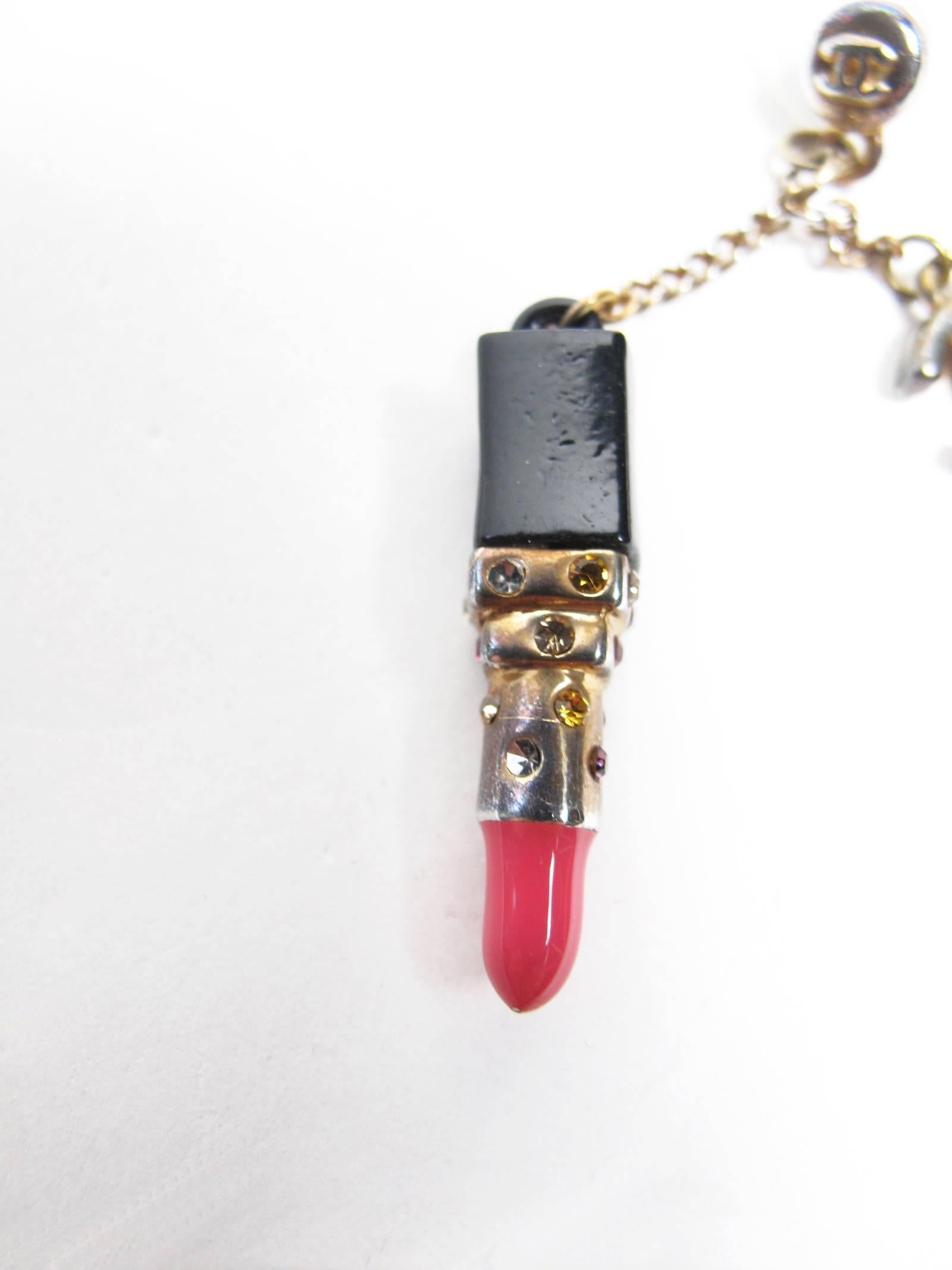 Chanel lipstick earrings. Condition: as is, some all over wear, see photos.  
2 1/4