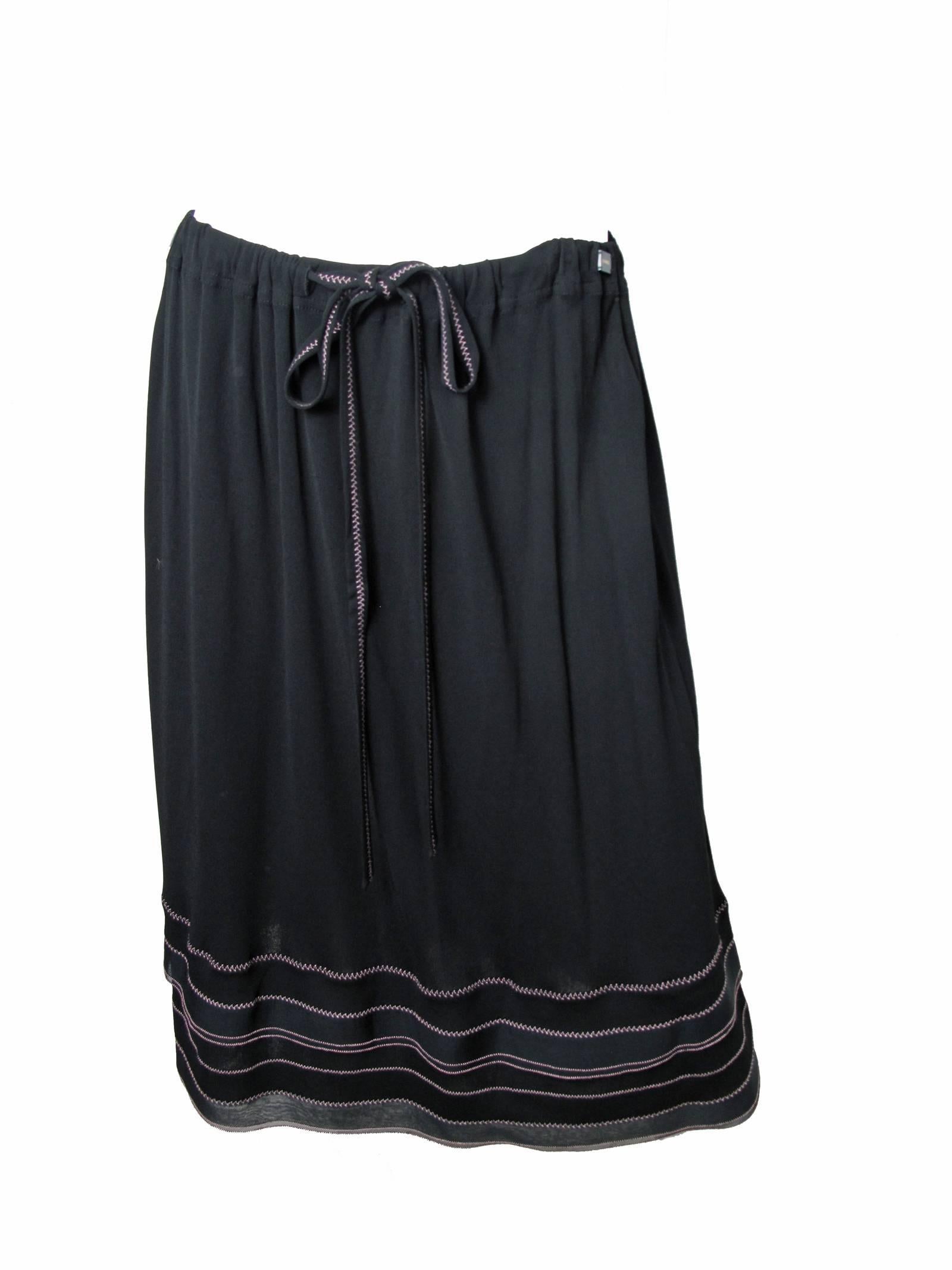 Chanel Black Skirt and Top with Pink Stitching and Ruffle Trim In Excellent Condition In Austin, TX
