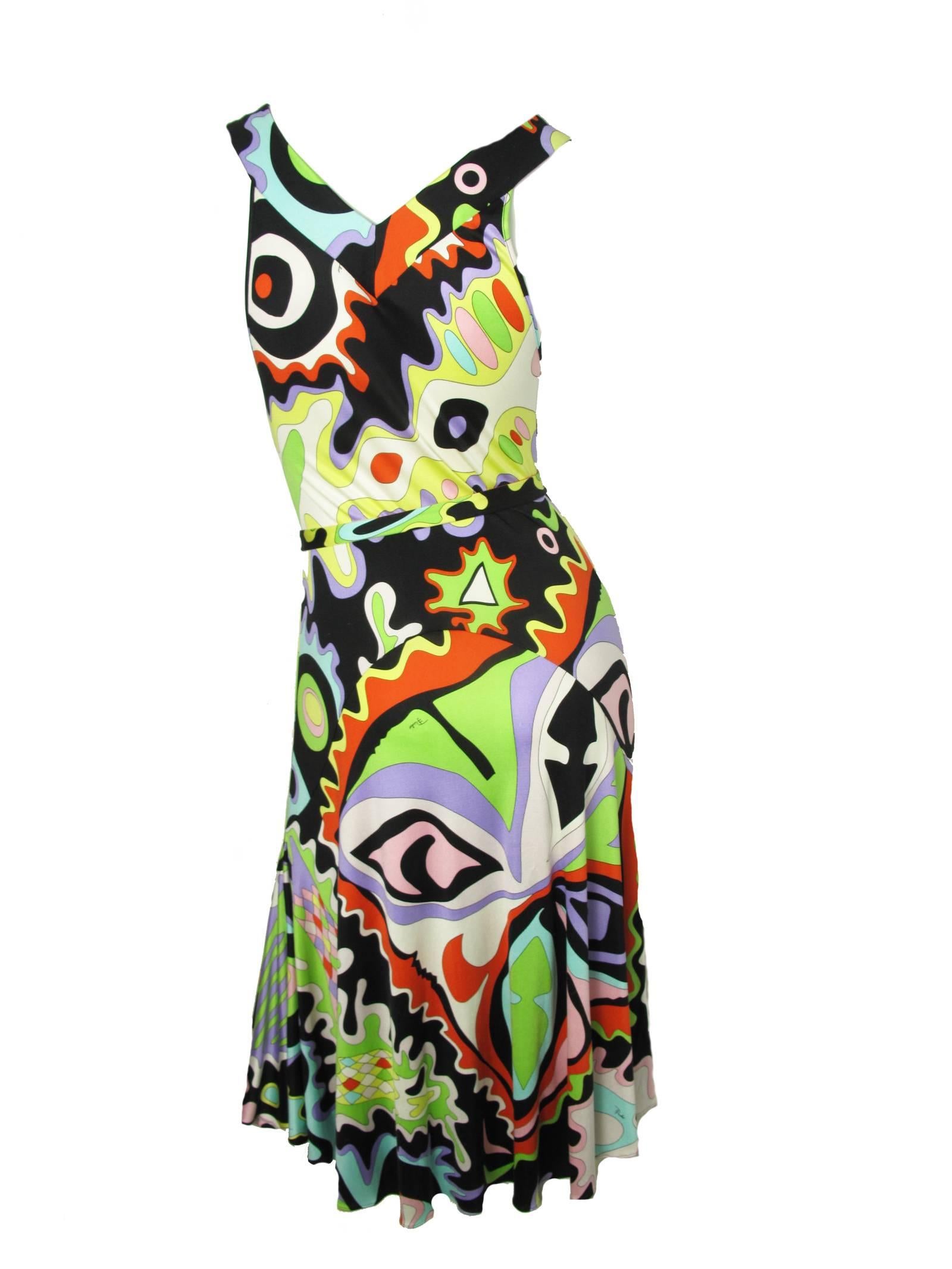 Pucci silk printed dress with belt.  Condition: Good, some pulls and small spot. Size 8

We accept returns for refund, please see our terms.  We offer free ground shipping within the US.  Please let us know if you have any questions.
