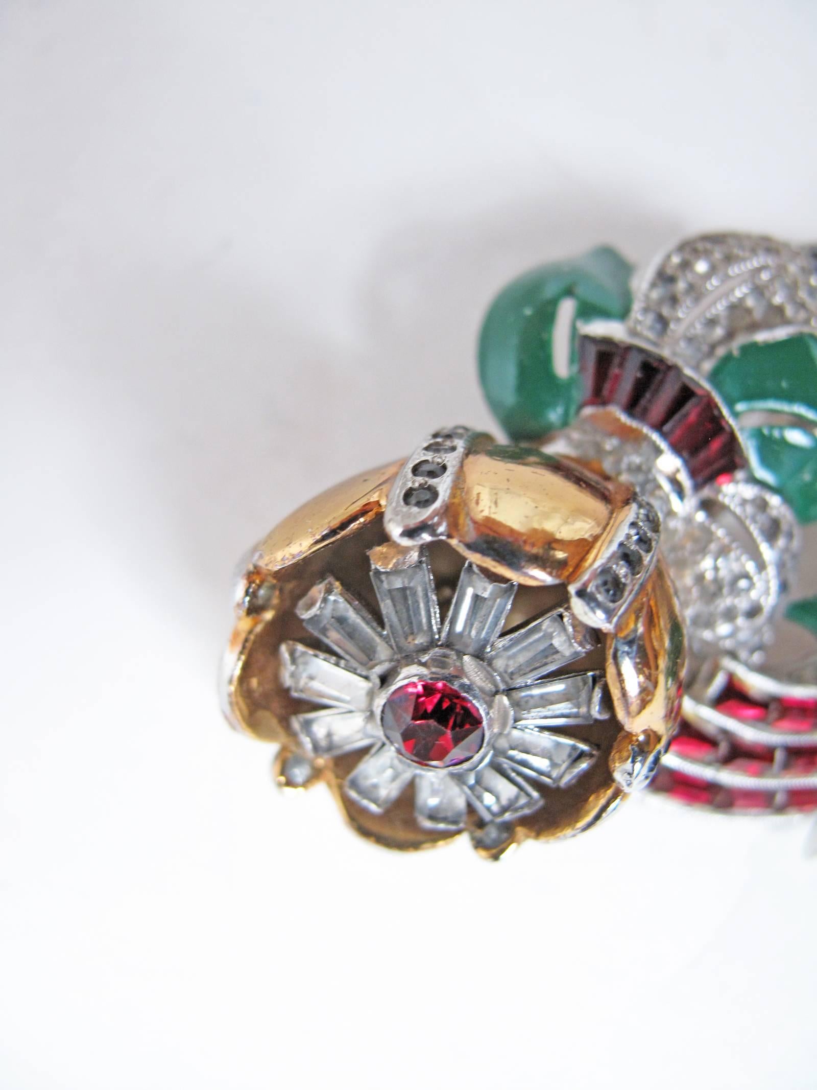 1930s Coro Duette rhinestone and enamel brooch or dress clip.  Condition: very good some enamel has chipped.  
3" W x 1 1/2" H 

