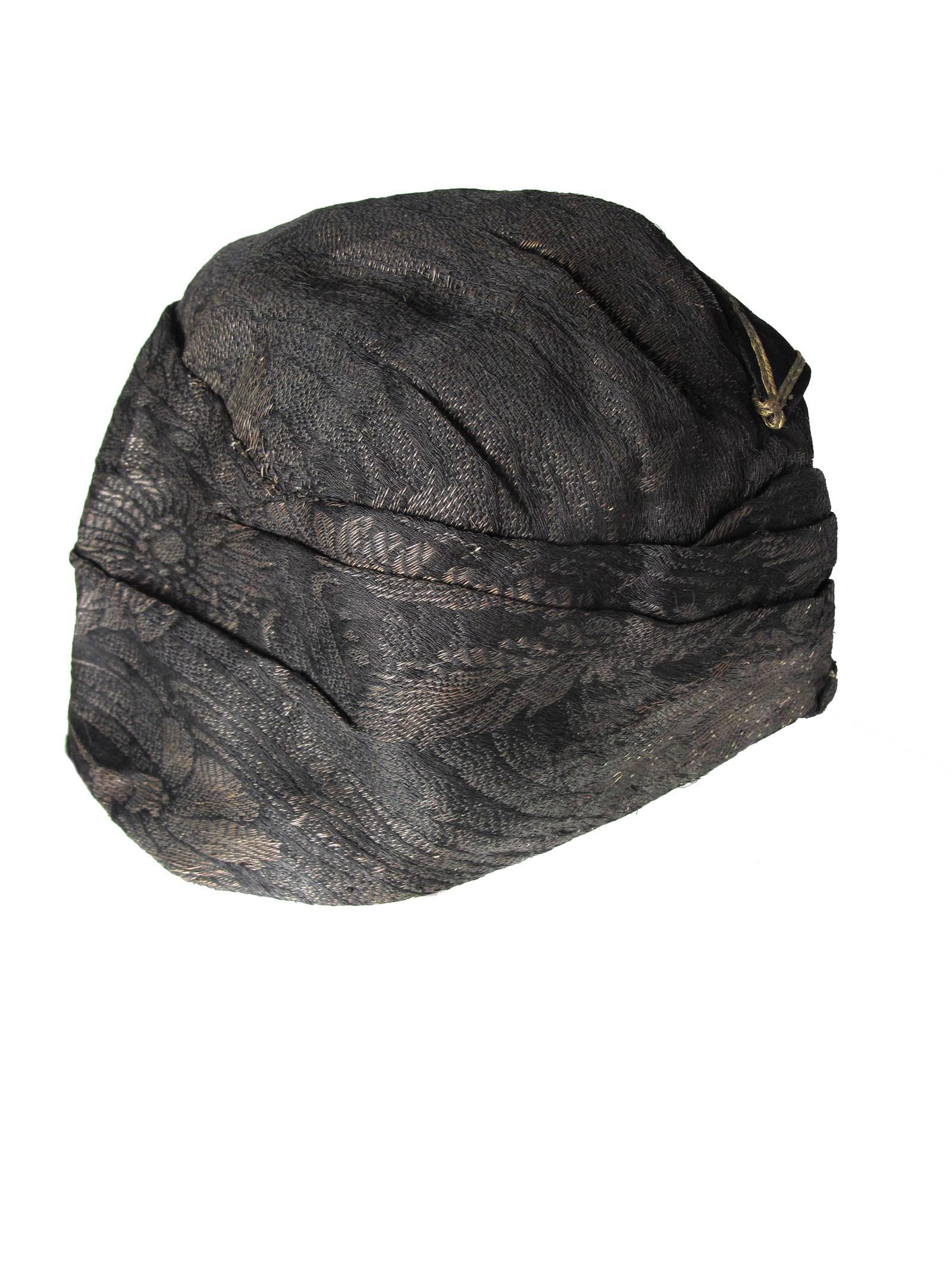1920s brocade hat
We accept returns for refund, please see our terms.  We offer free ground shipping within the US.  Please let us know if you have any questions. 
