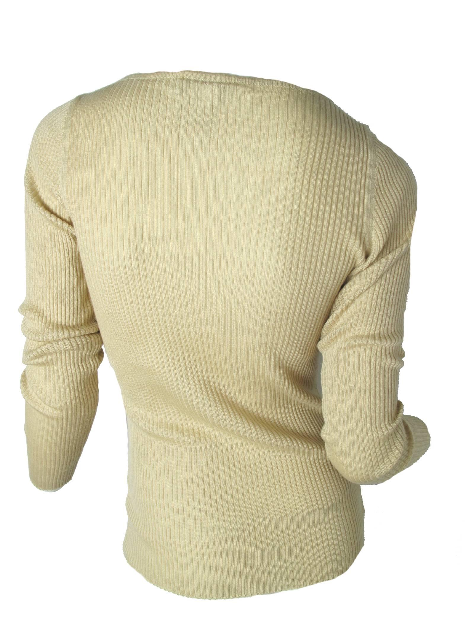 Chanel beige cashmere/silk ribbed sweater with boat neck. Circa 1999. Size 42

We accept returns for refund, please see our terms.  We offer free ground shipping within the US.  Please let us know if you have any questions. 