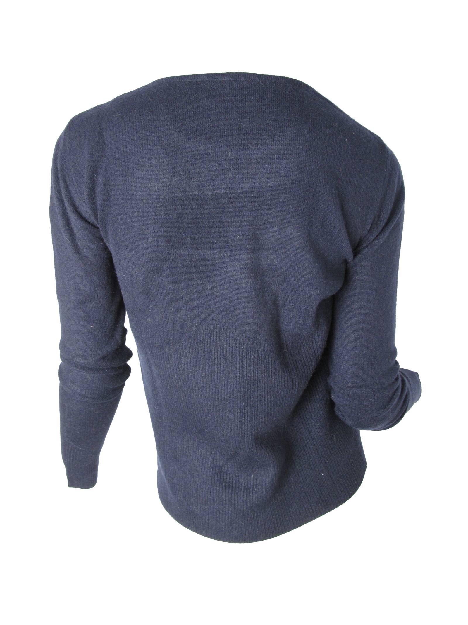 Missoni navy cashmere pull over sweater.  Condition: Excellent. Size 40. 
We accept returns for refund, please see our terms.  We offer free ground shipping within the US.  Please let us know if you have any questions. 