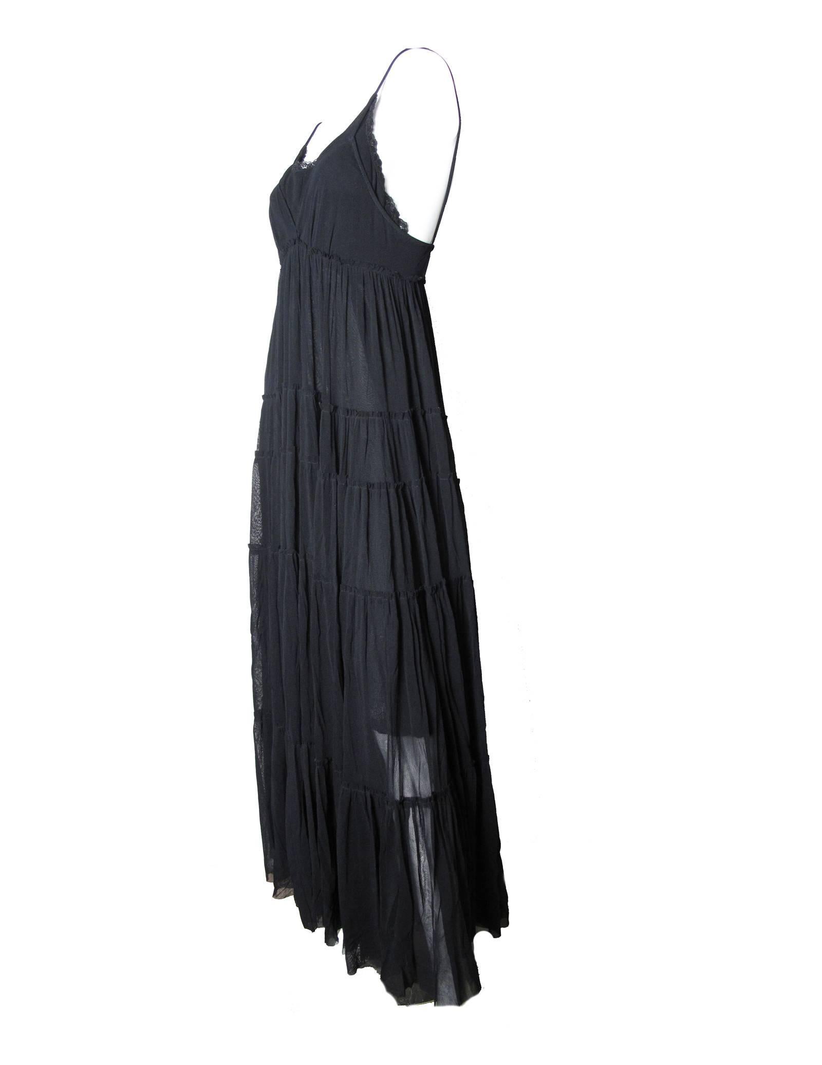Jean Paul Gaultier long black sheer mesh gown with spaghetti straps and lace trim at collar.  Nylon fabric. Fabric is stretchy. Condition: Excellent Size L

We accept returns for refund, please see our terms. We offer free ground shipping within