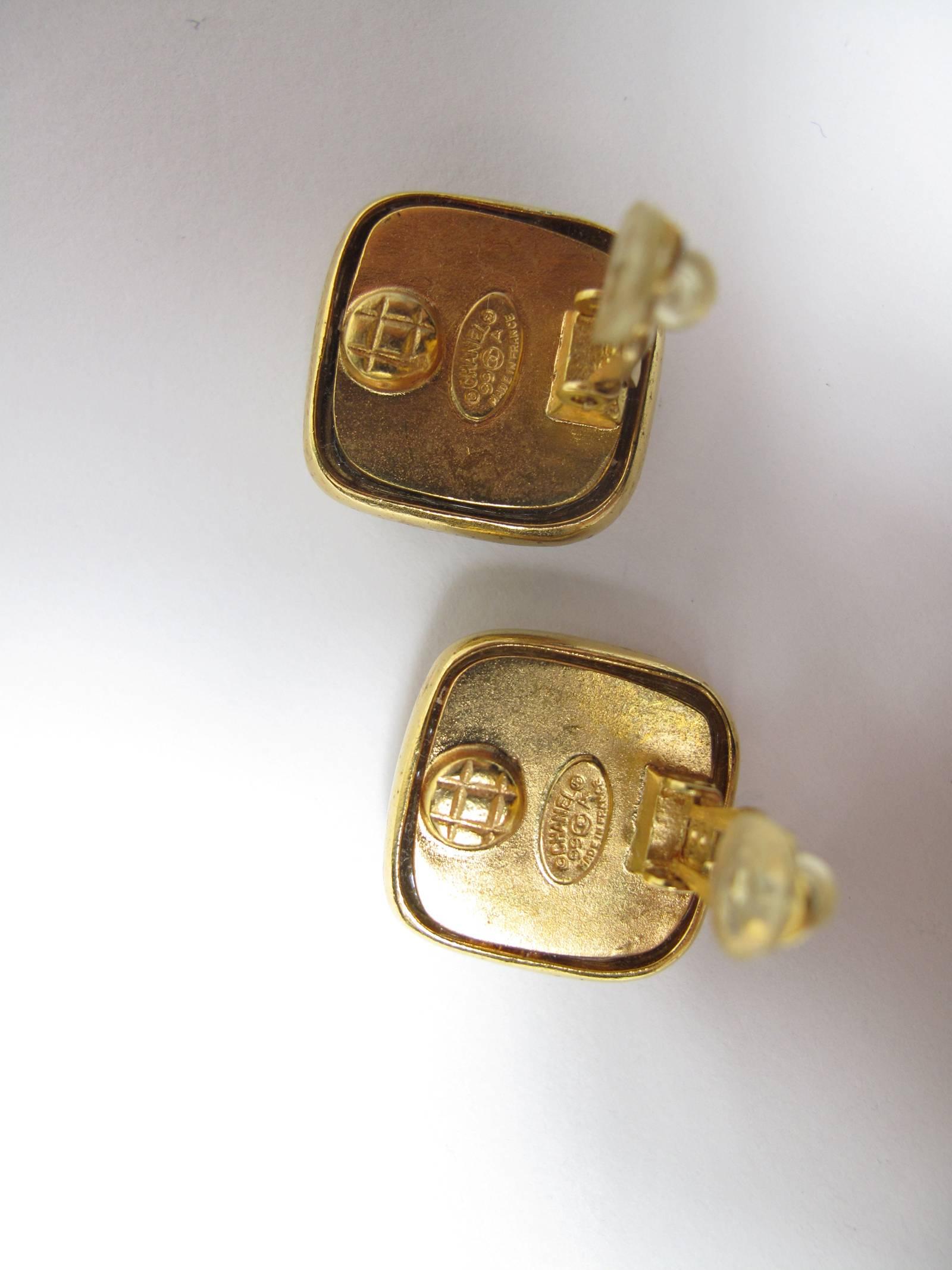 Chanel 1999 CC clip on earrings.  Condition: Excellent. 
We accept returns for refund, please see our terms.  We offer free ground shipping within the US.  Please let us know if you have any questions. 

