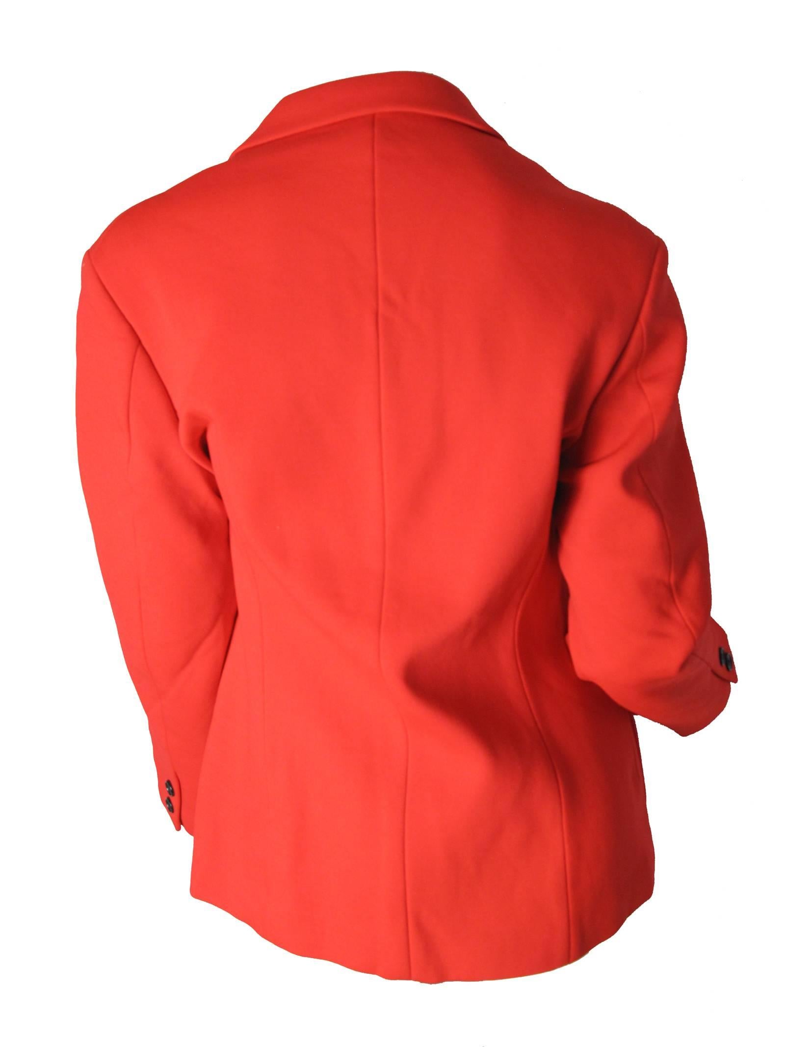 1980s Yohji Yamamoto red nylon and polyurethane blazer.  One button closure, two front pockets.  Condition: Very good, some very small darks spots. 
Size Medium
We accept returns for refund, please see our terms.  We offer free ground shipping