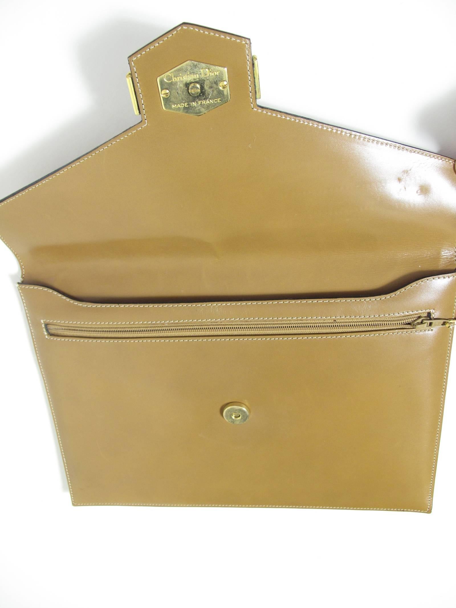 Christian Dior tan leather envelope clutch.  Condition: Excellent.  8 1/4