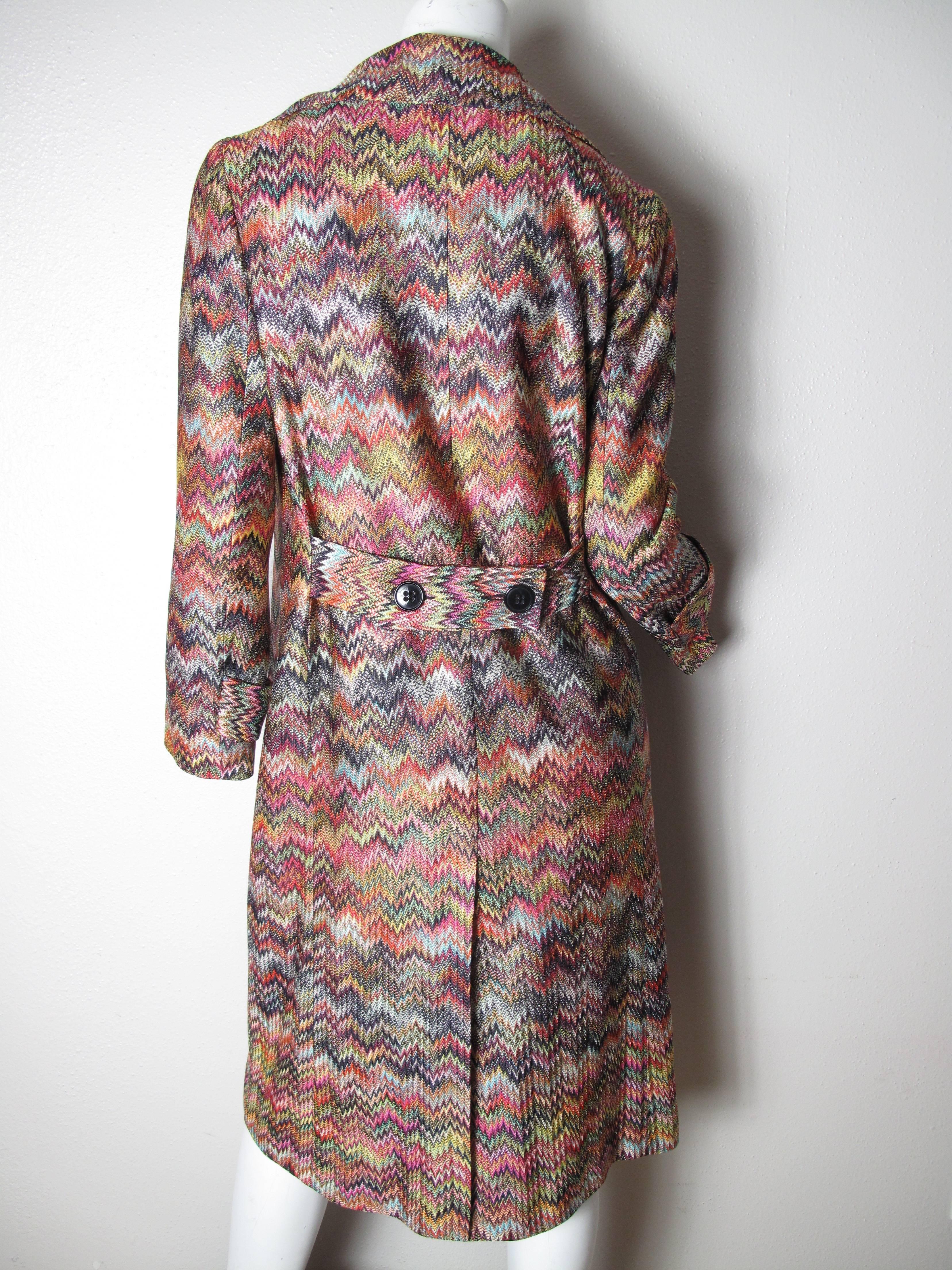 Missoni knit trench coat, buttons down front, two side pockets.  Condition: Excellent. Size 44

We accept returns for refund, please see our terms.  We offer free ground shipping within the US.  Please let us know if you have any questions.