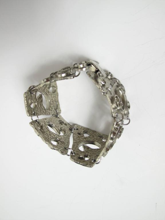 1970s Hobe silver metal cutout heavy abstract link bracelet.  Condition: Excellent. 
We accept returns for refund, please see our terms.  We offer Free Ground Shipping within the US.  Please let us know if you have any questions. 
