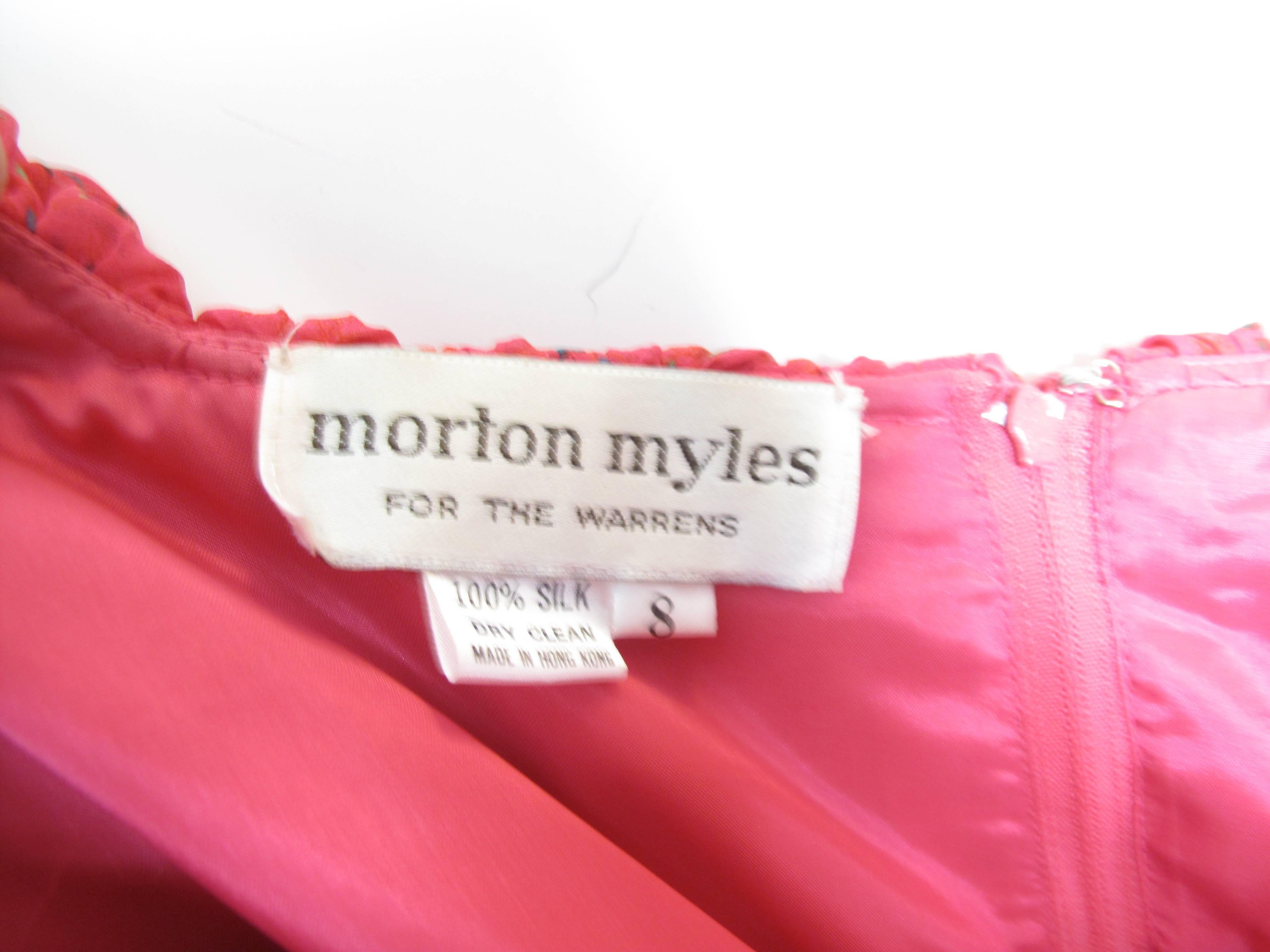 Morton Myles silk chiffon gown.  Condition: Excellent.  Size 8 

We offer free ground shipping within the US.  We accept returns for refund, please see our terms.  Please let us know if you have any questions. 